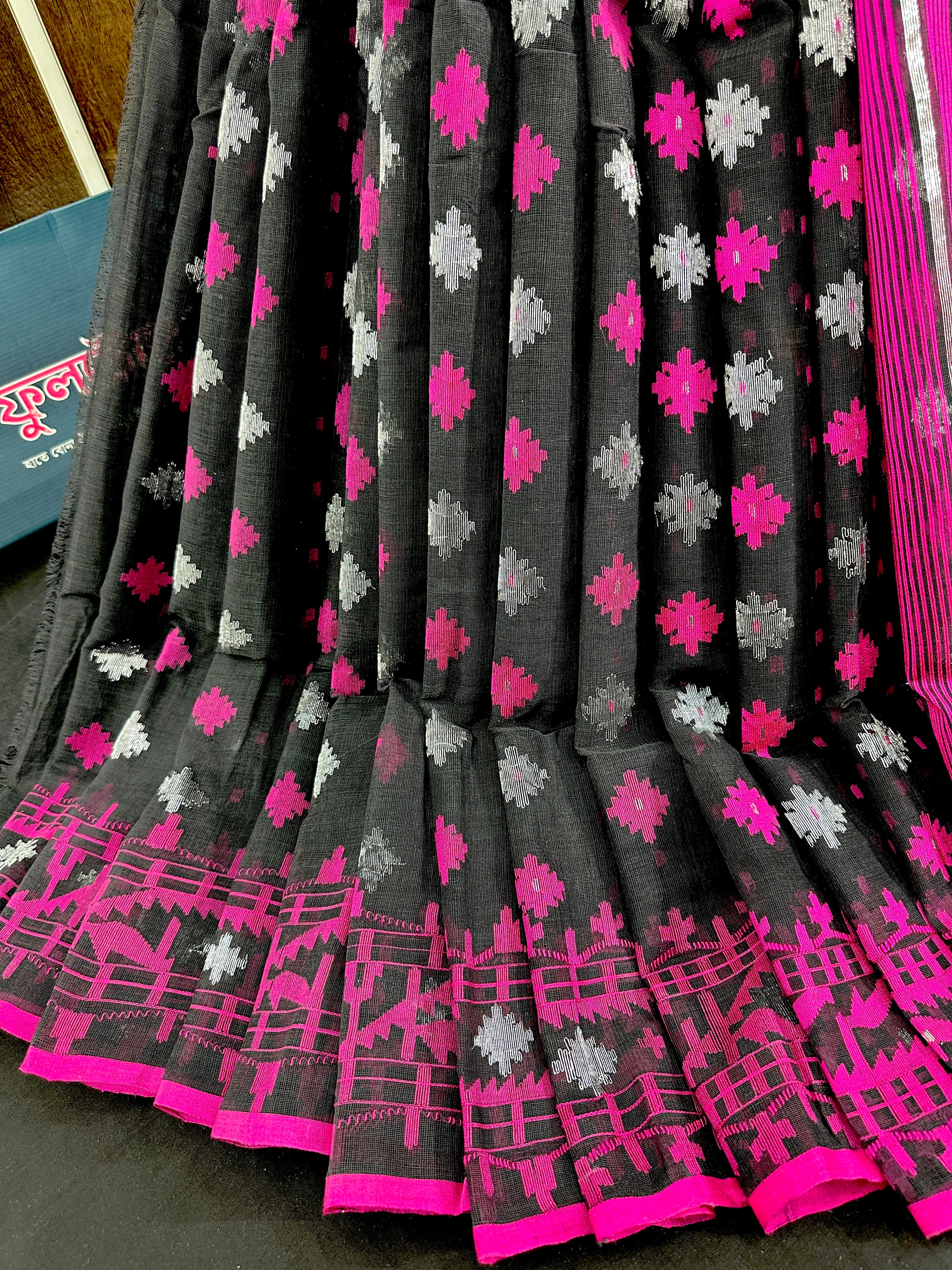 Black cotton jamdani saree with magenta threads work and silver jori work