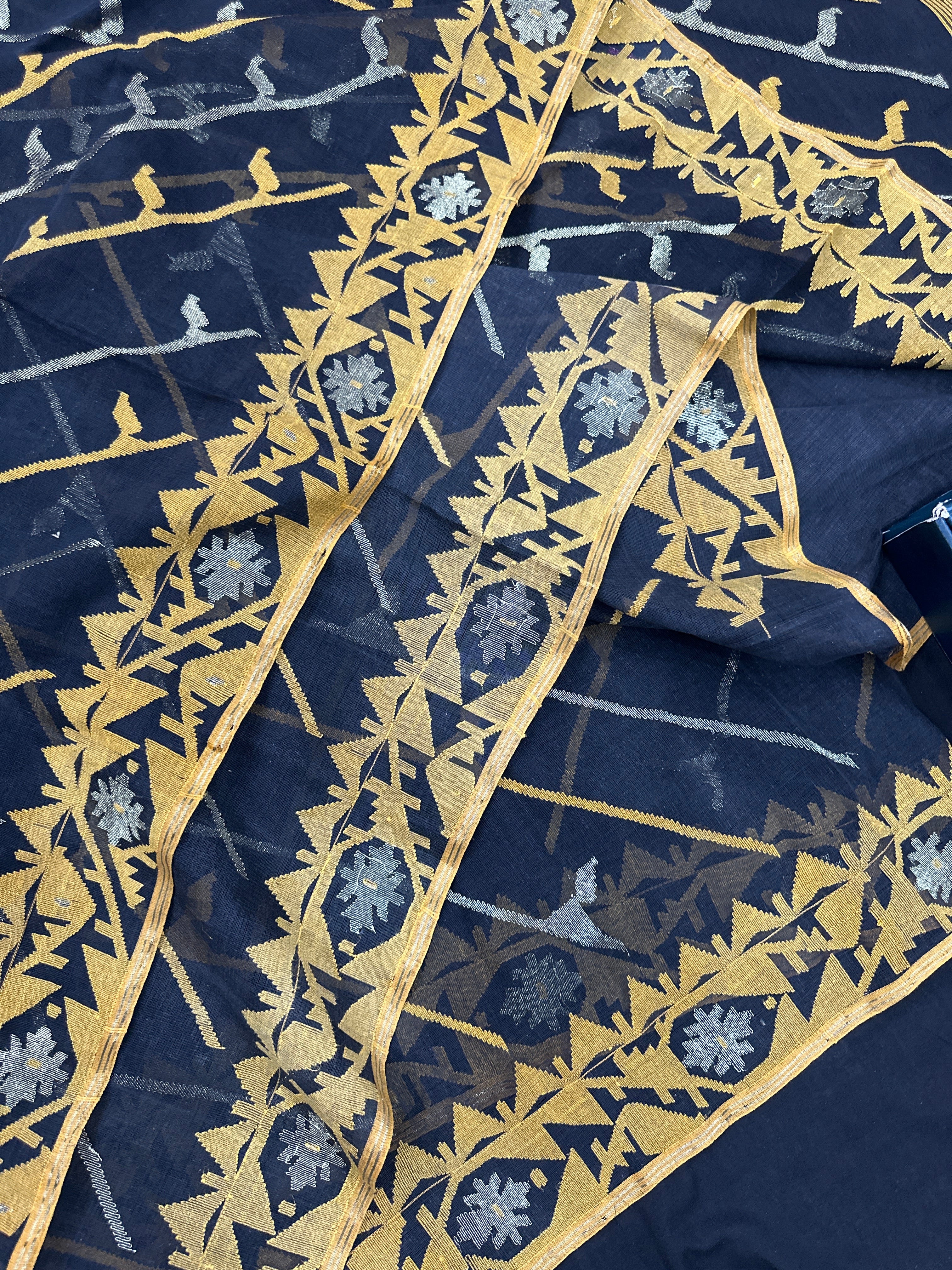 Black cotton jamdani saree with yellow threads work and Silver jori work & blouse piece.