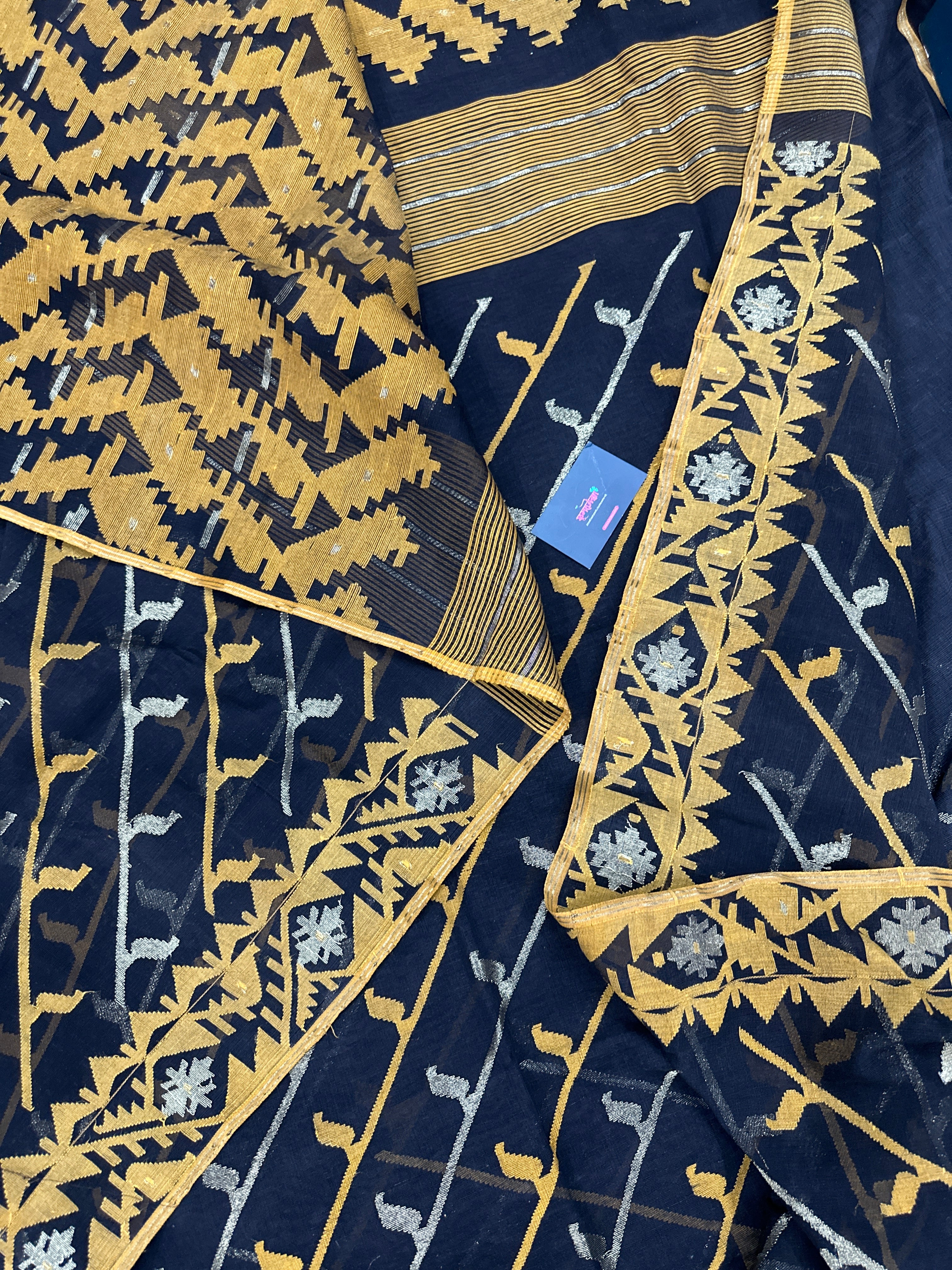 Black cotton jamdani saree with yellow threads work and Silver jori work & blouse piece.