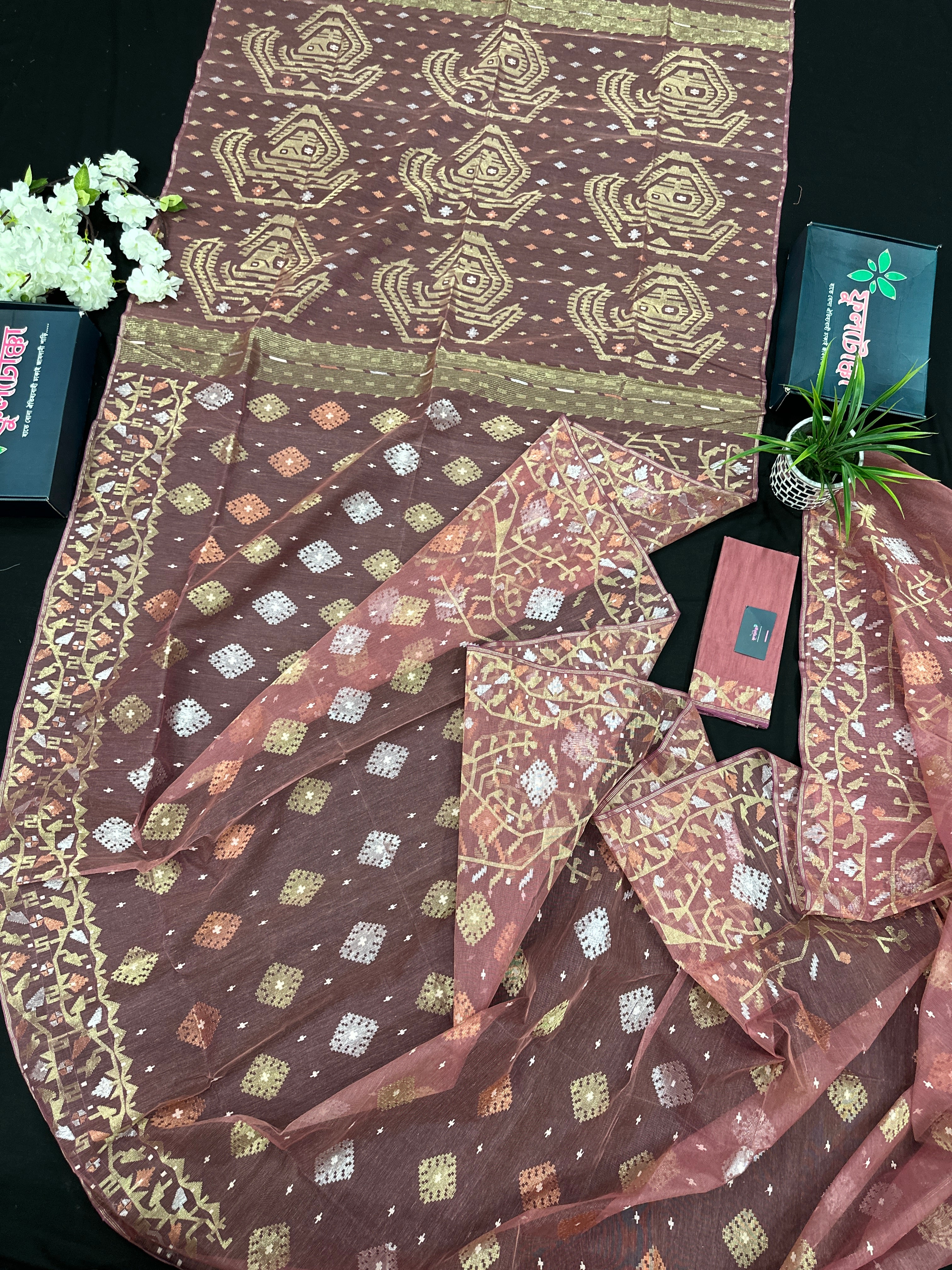 Nude Onion Exclusive Dhakai Jamdani saree with golden silver & copper jori work.