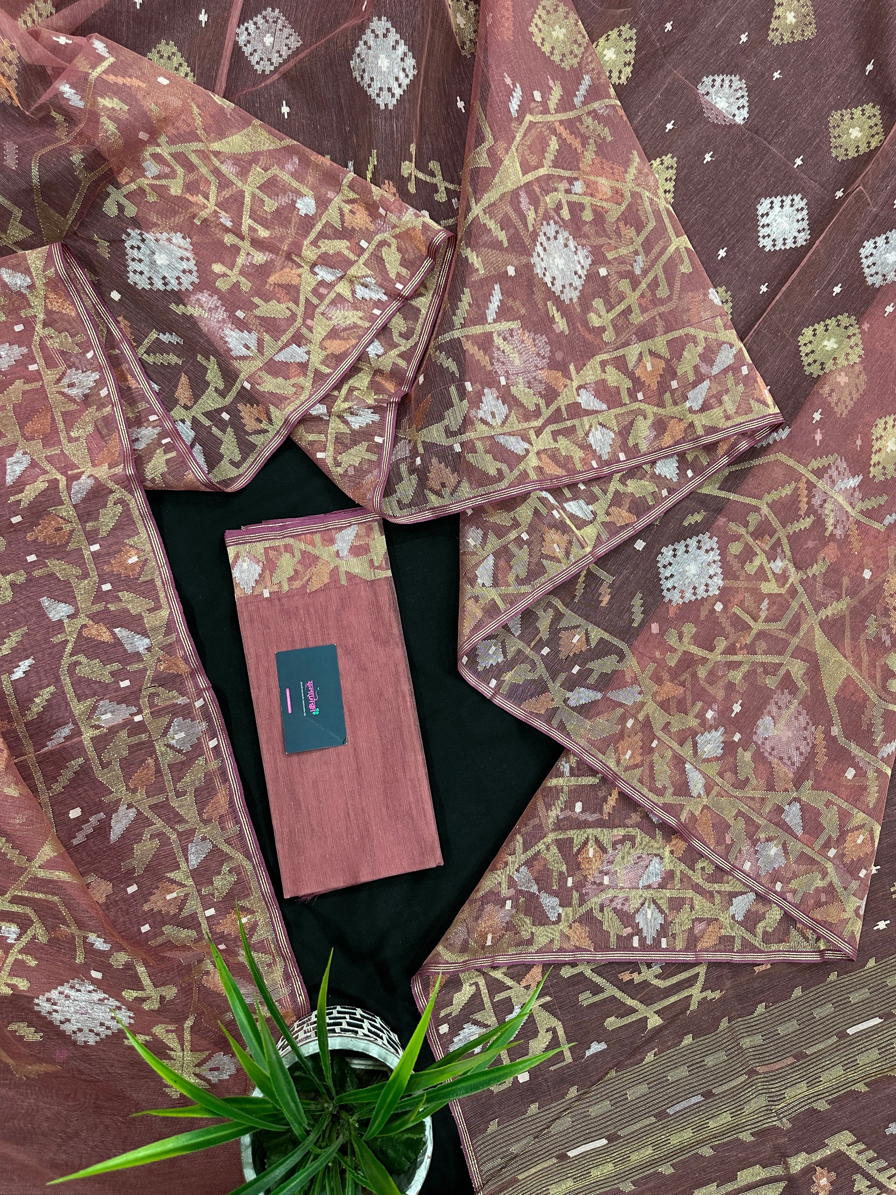 Nude Onion Exclusive Dhakai Jamdani saree with golden silver & copper jori work.