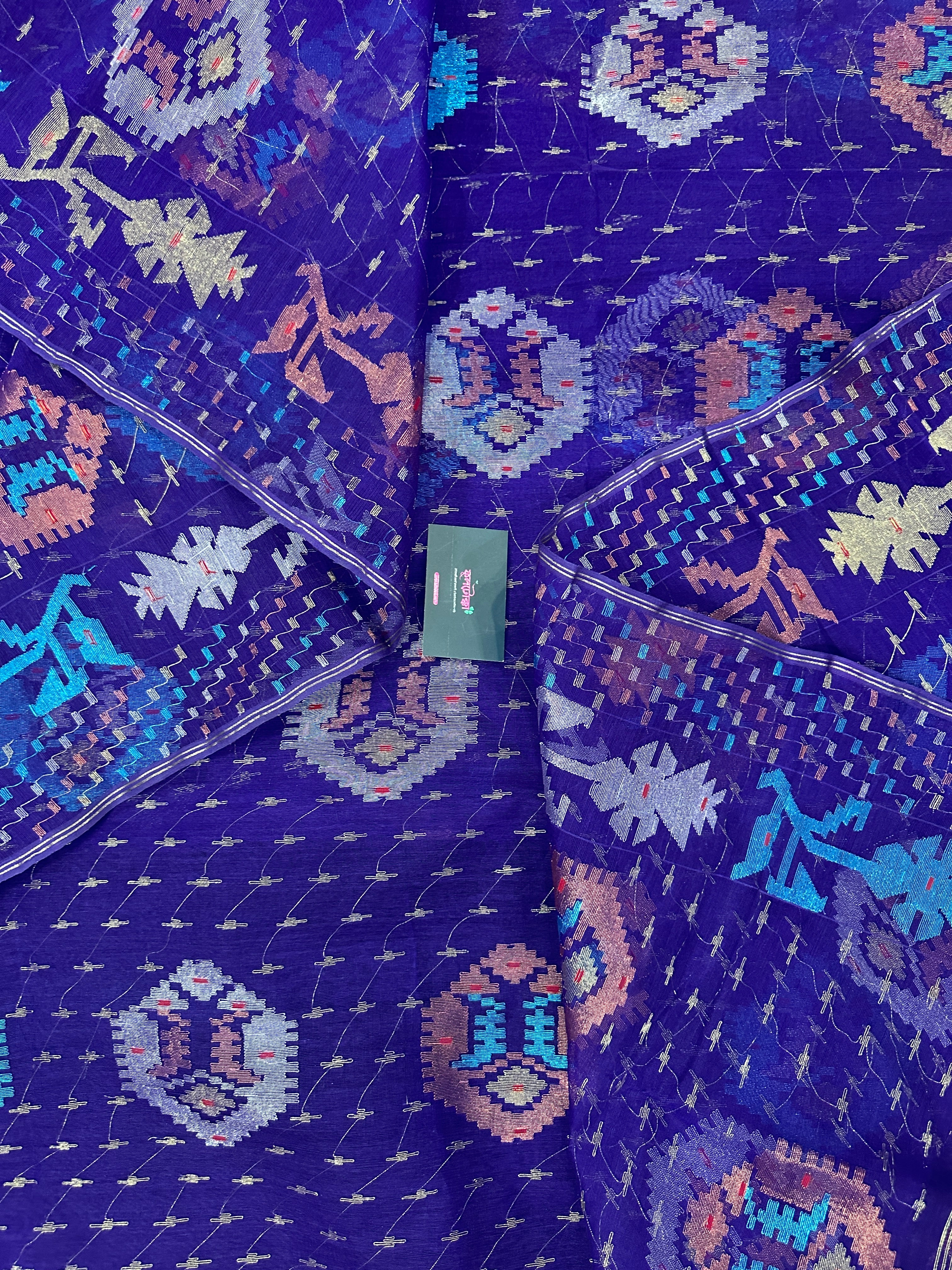 Dual Toned Purple Jamdani Saree With Golden Silver & Copper Jori Work.