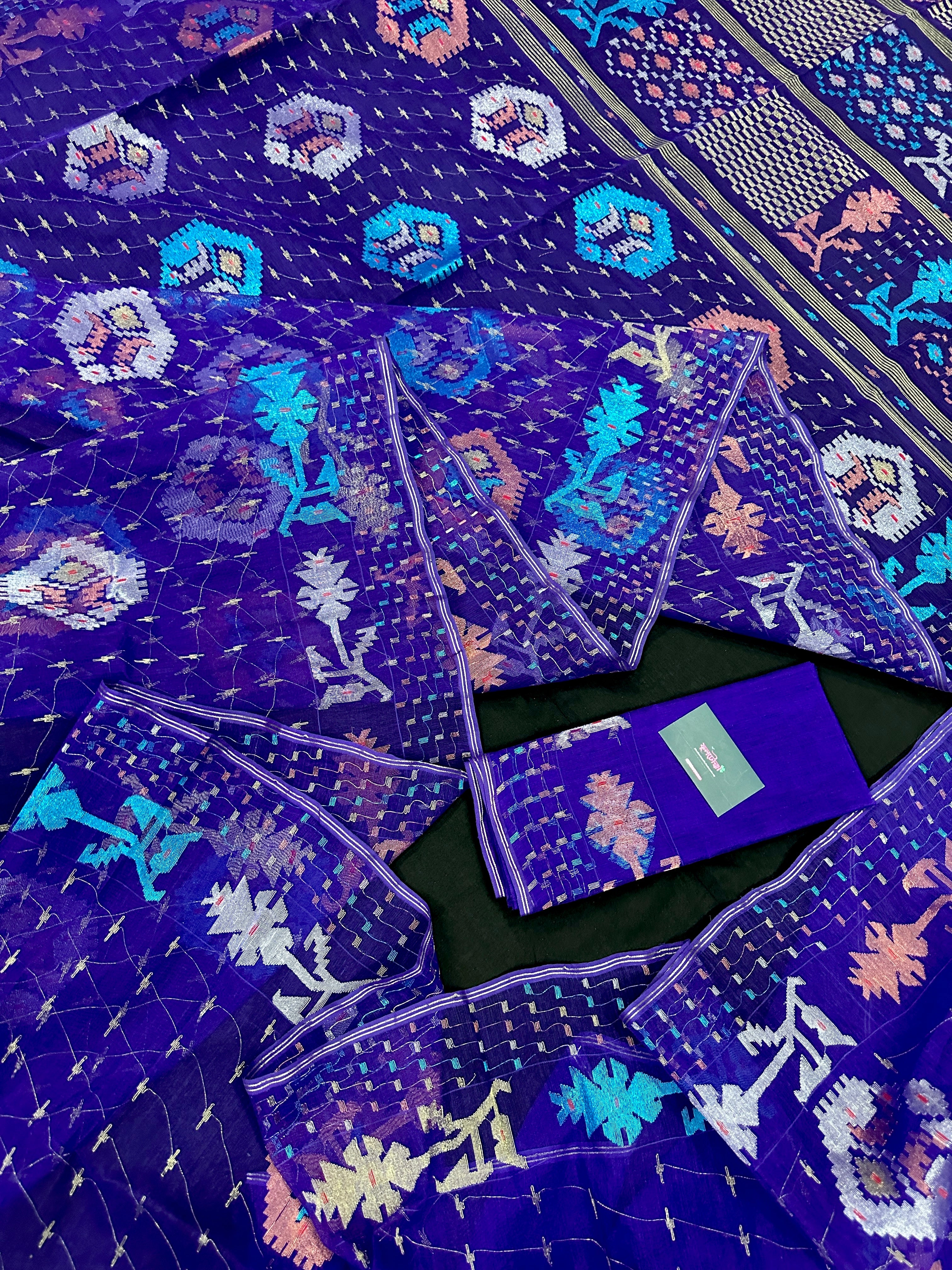 Dual Toned Purple Jamdani Saree With Golden Silver & Copper Jori Work.