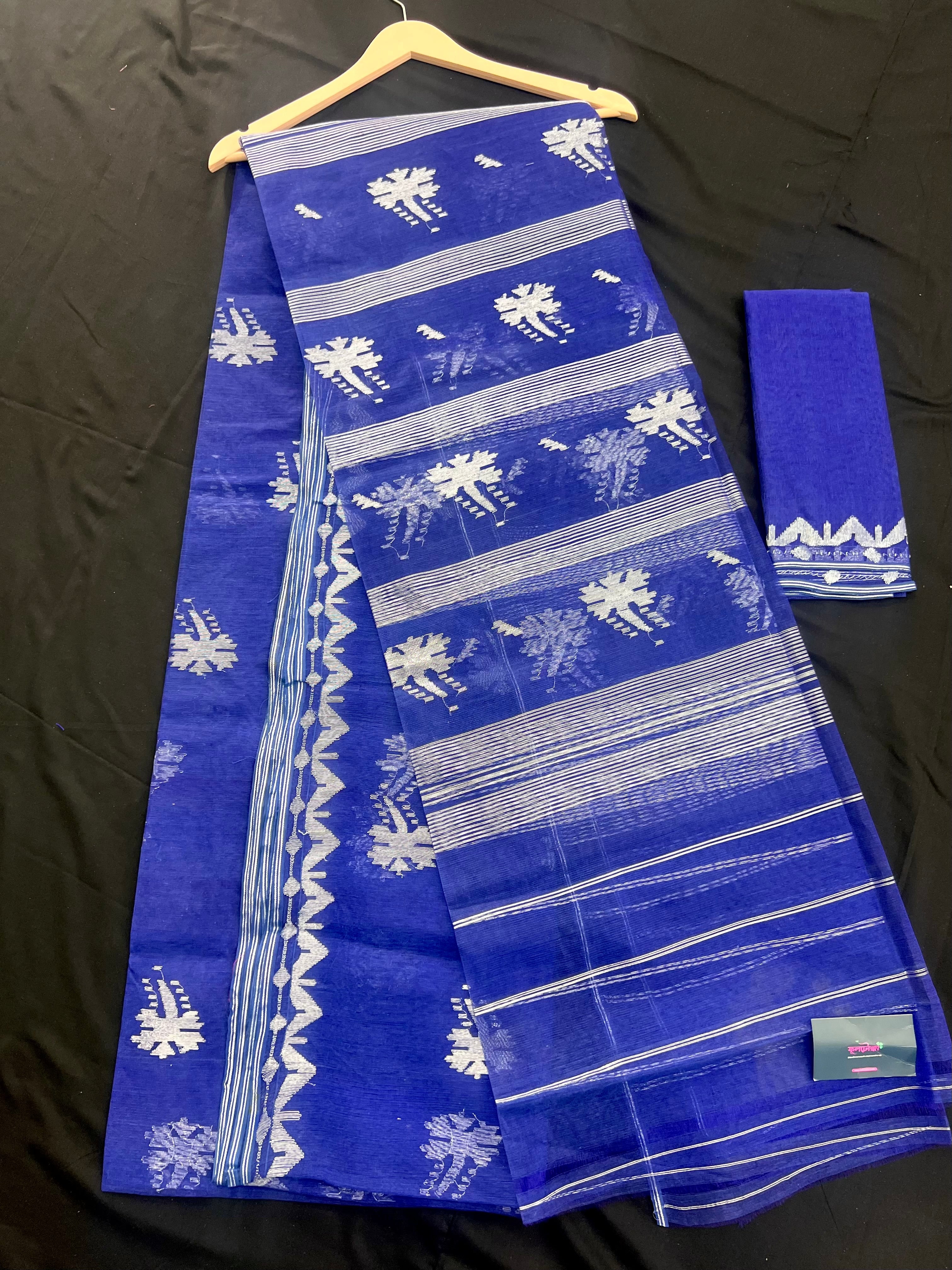 Blue halfsilk jamdani saree with silver jori work flower design