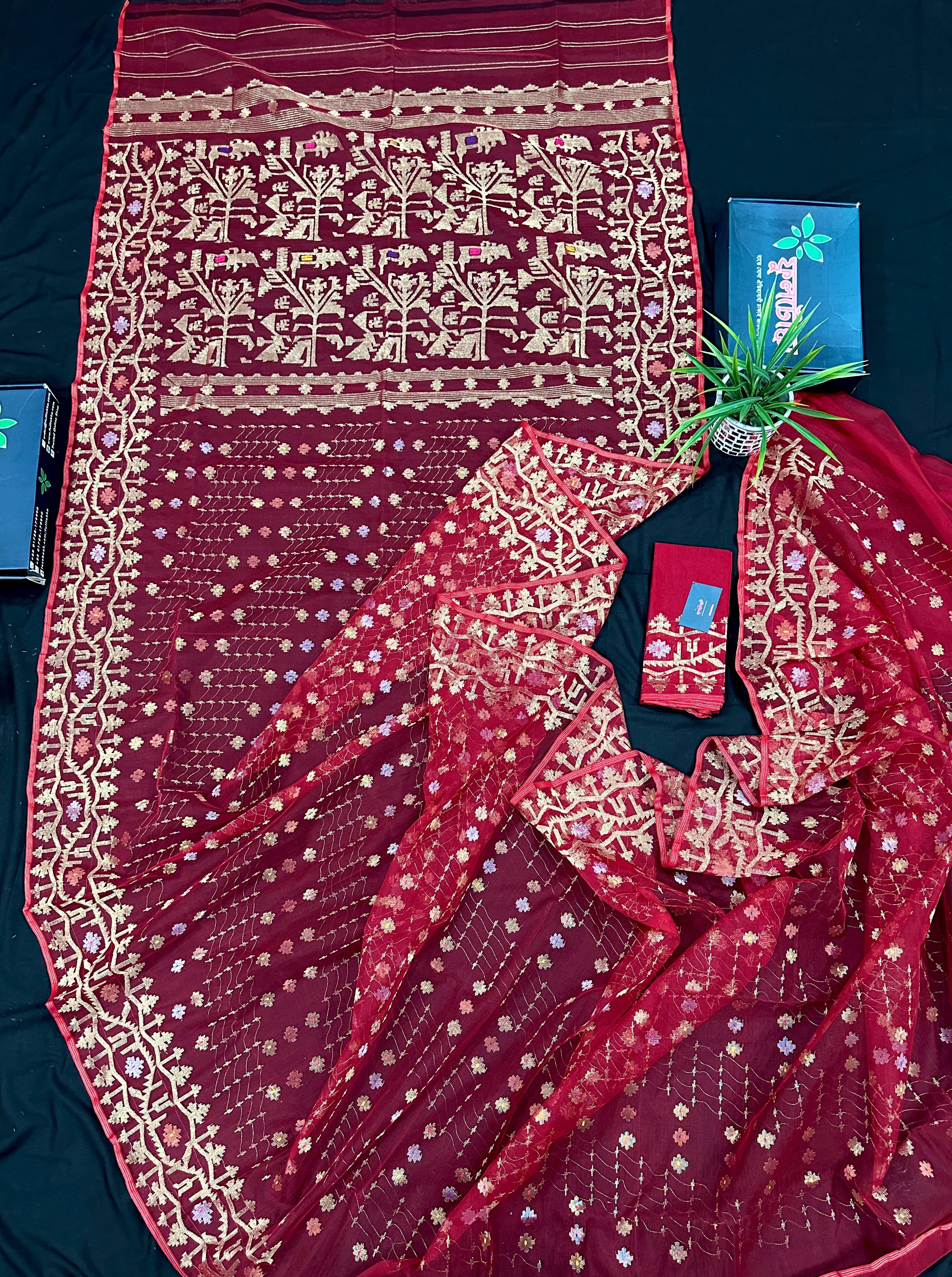 Reddish Maroon Bridal Exclusive dhakai jamdani saree with all over golden jori work soft count.