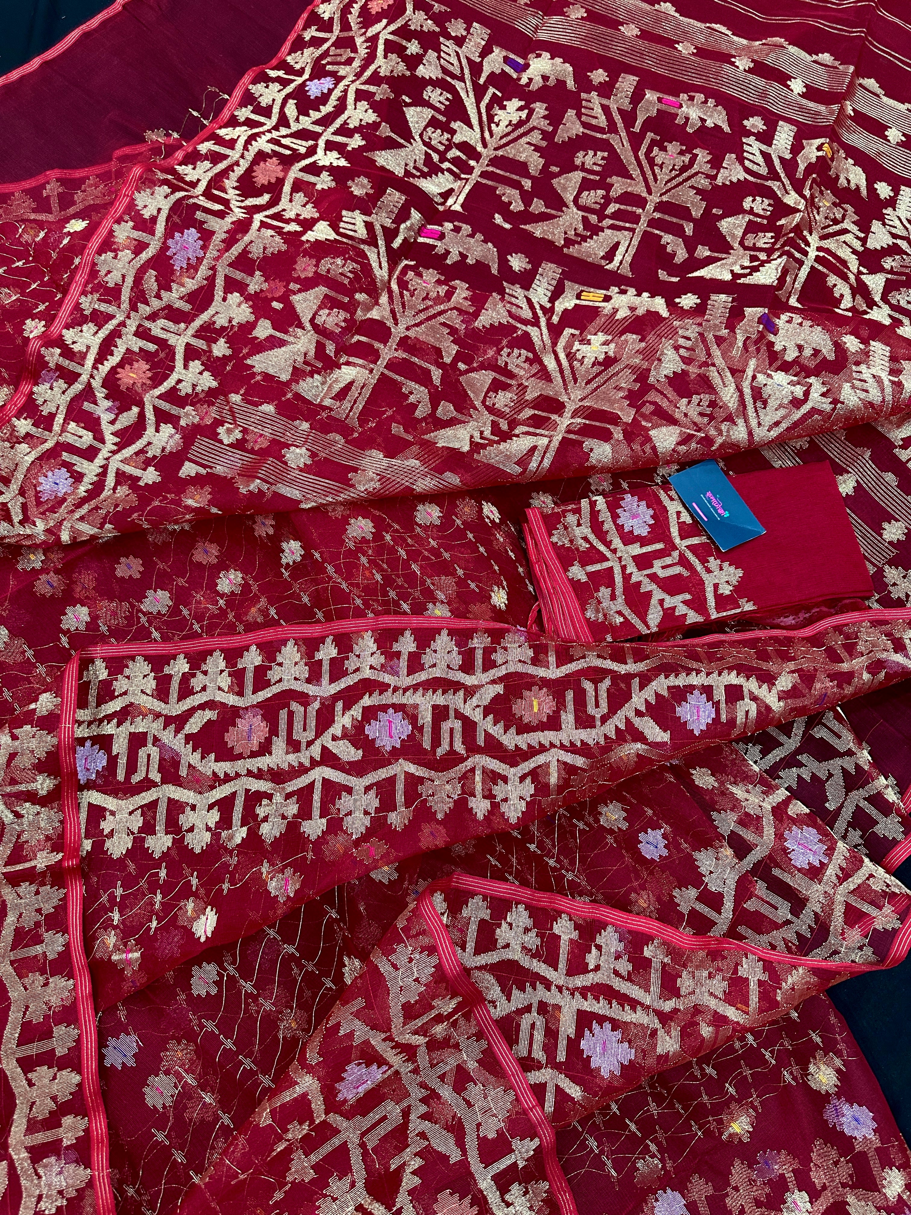 Reddish Maroon Bridal Exclusive dhakai jamdani saree with all over golden jori work soft count.