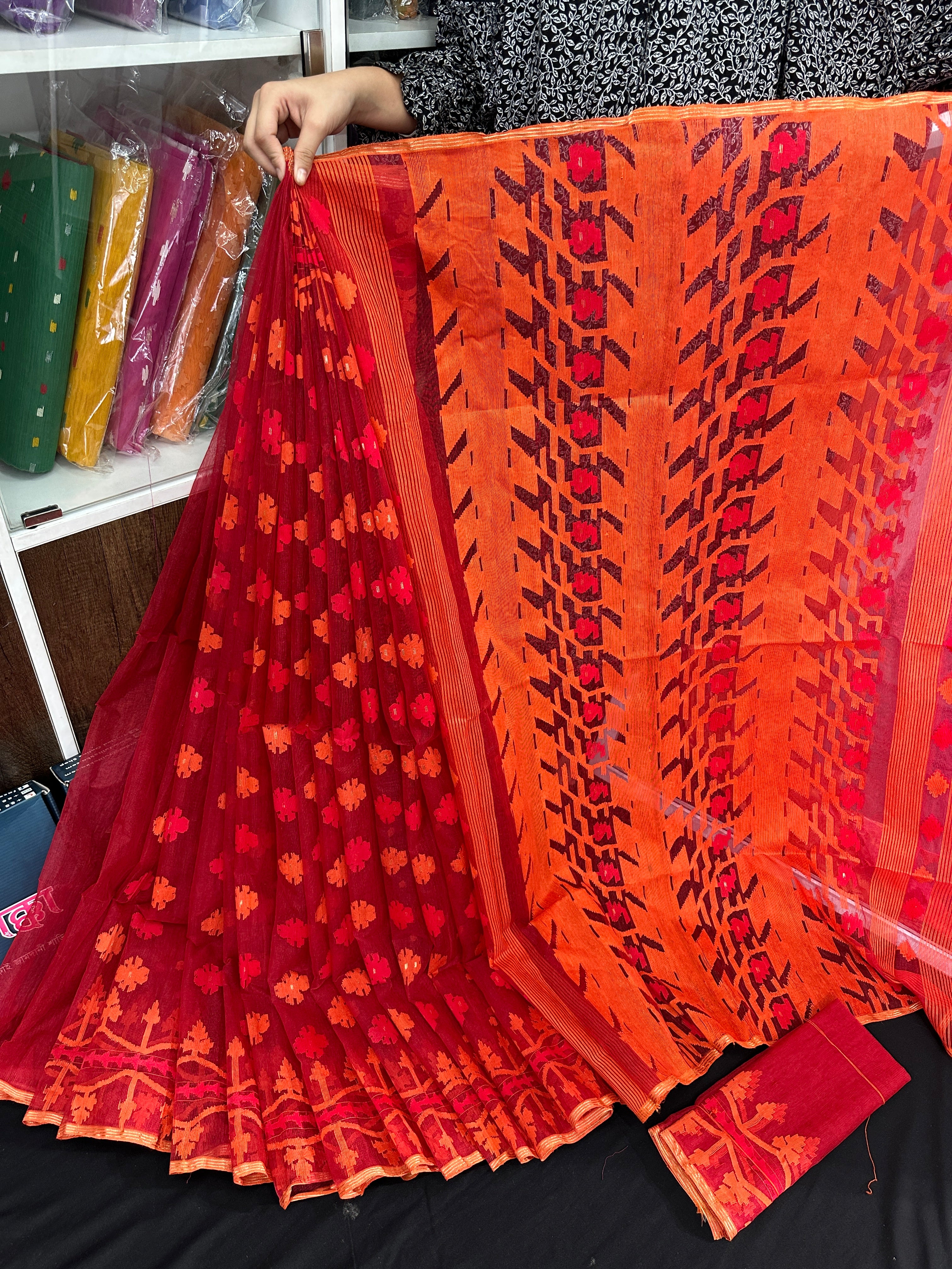 Maroon red jamdani saree with orange and red threads work