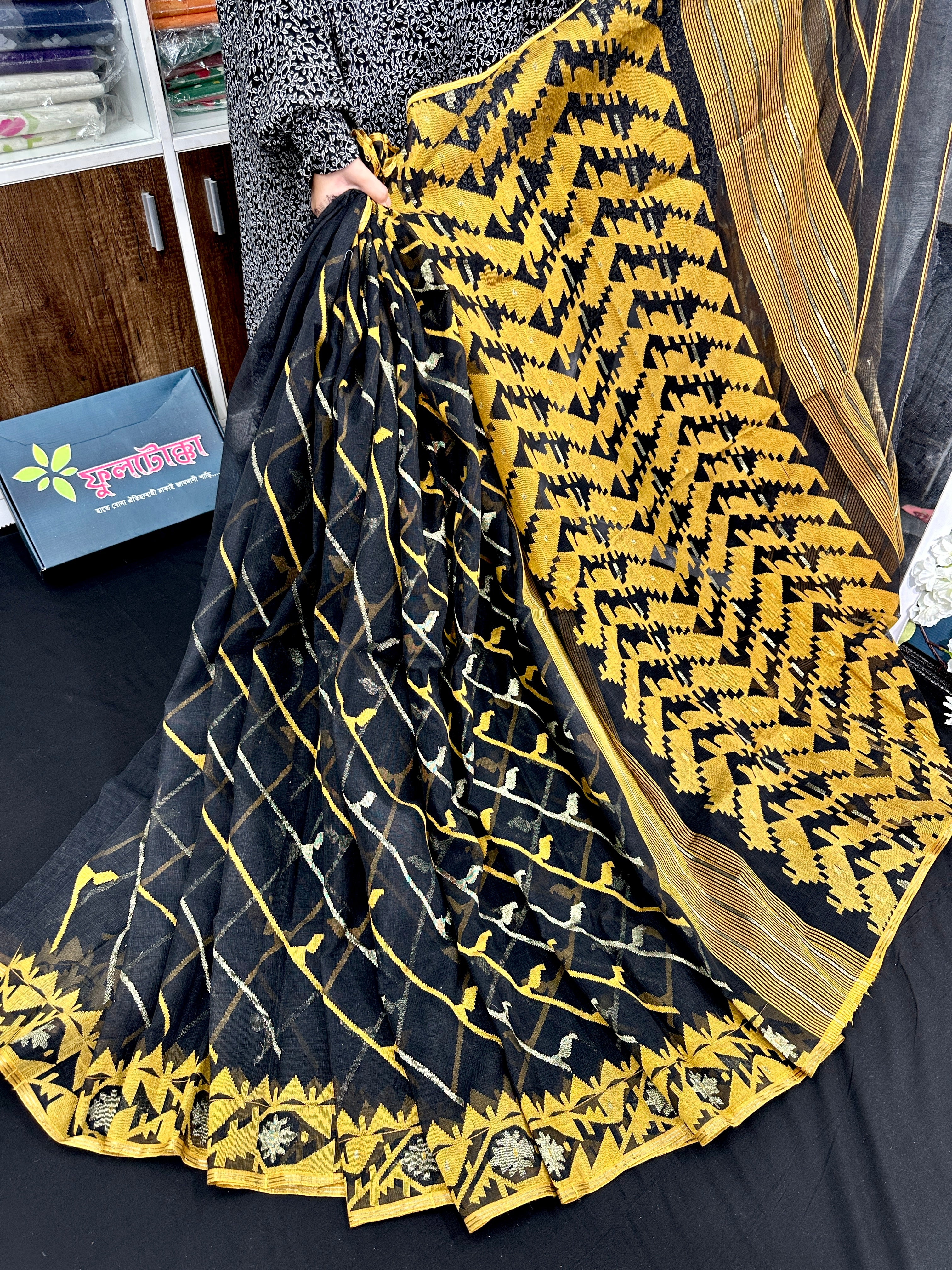 Black cotton jamdani saree with yellow threads work and Silver jori work & blouse piece.
