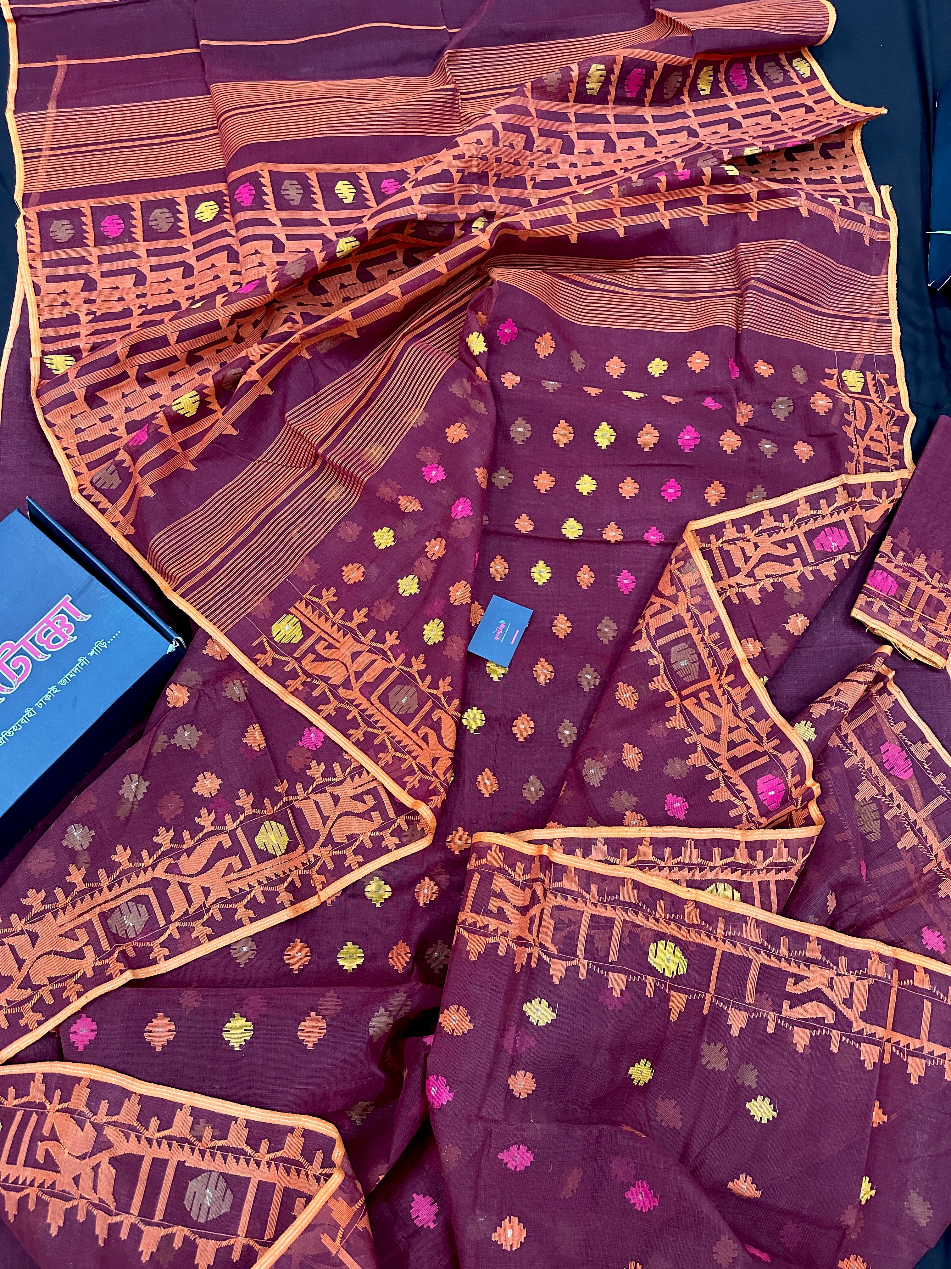 Bitrut colour cotton jamdani saree with yellow orange and pink threads work & blouse piece.