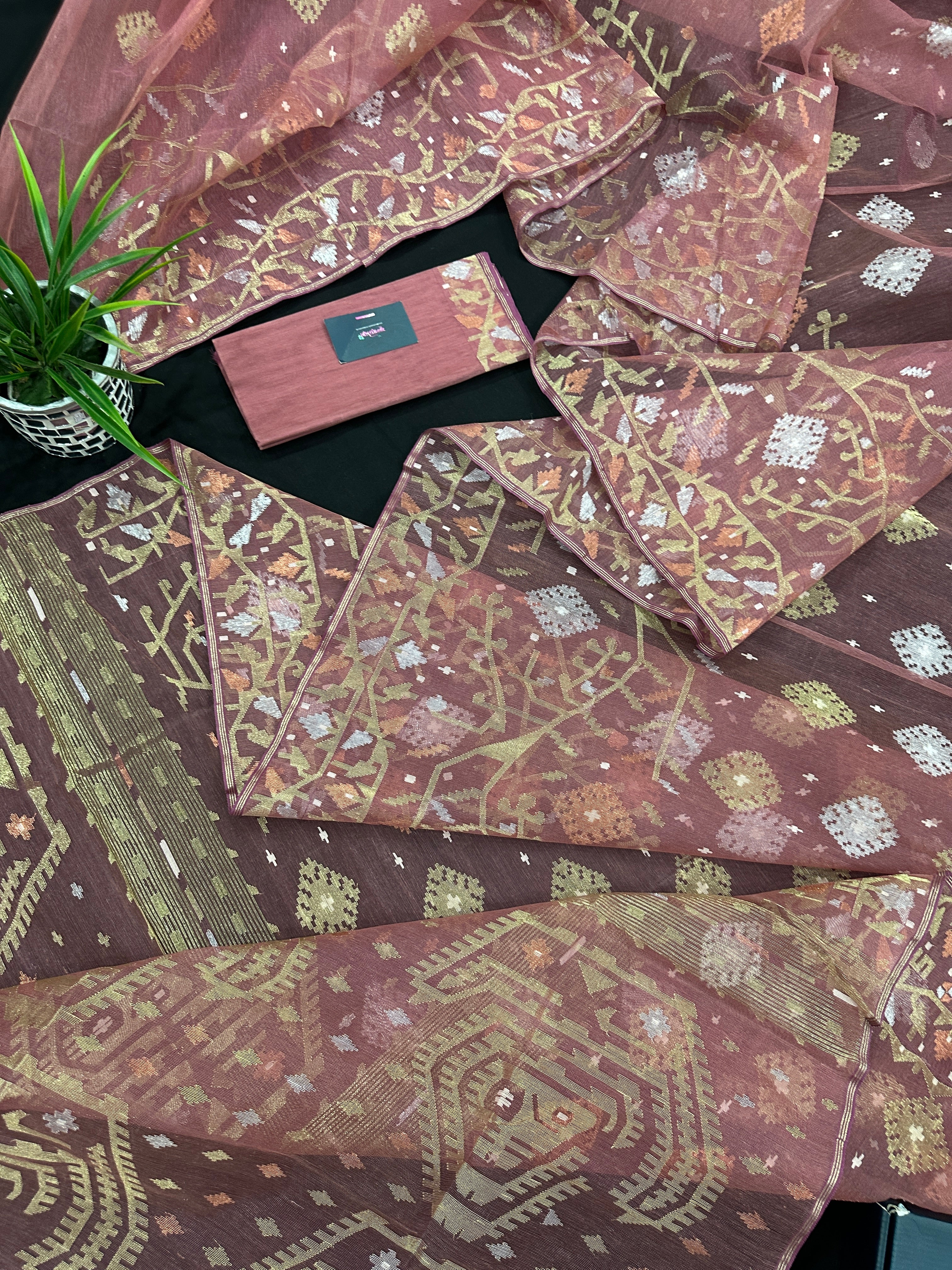 Nude Onion Exclusive Dhakai Jamdani saree with golden silver & copper jori work.