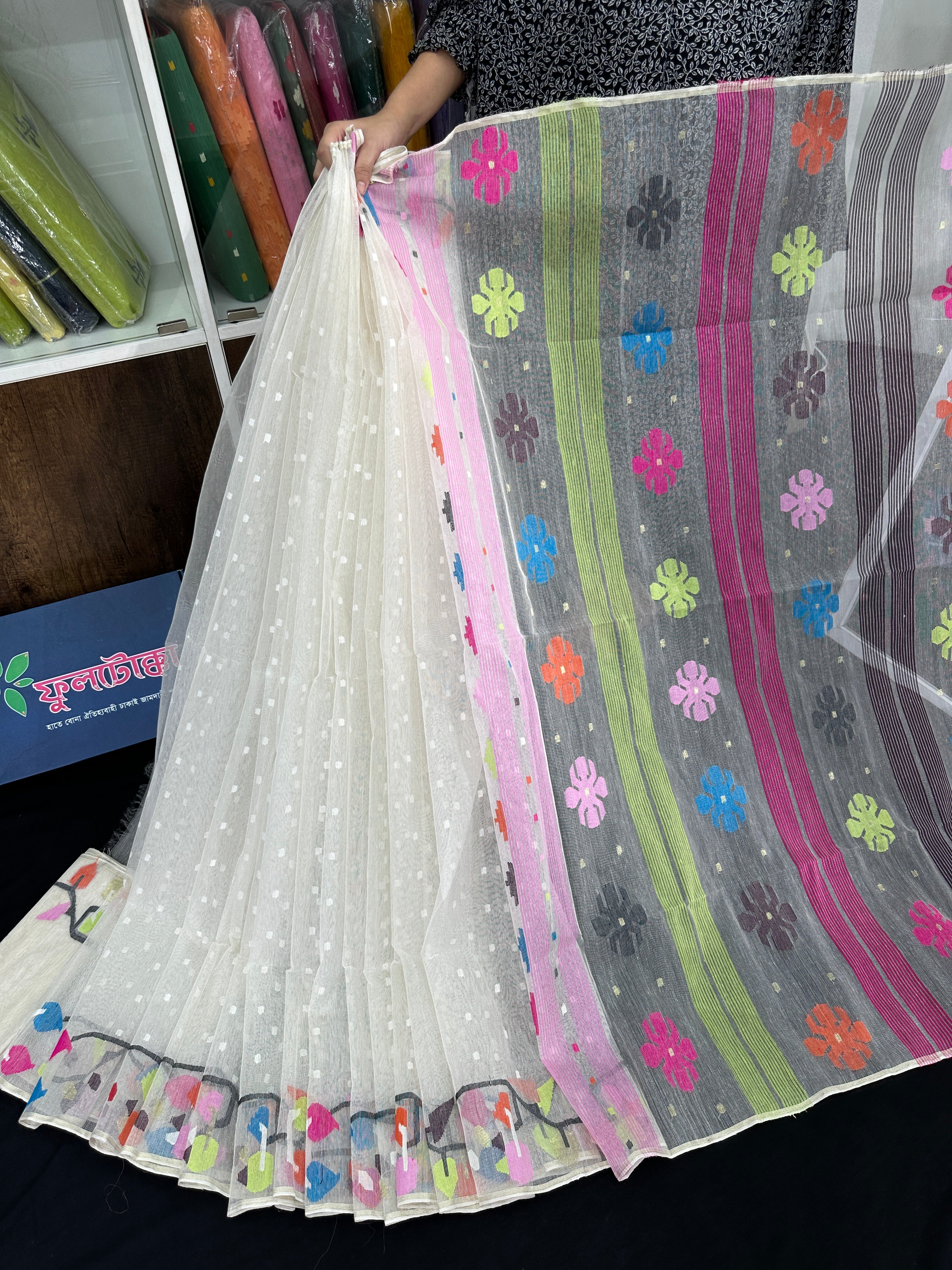 White cotton jamdani saree with pink blue orange magenta yellow multiple colour threads work