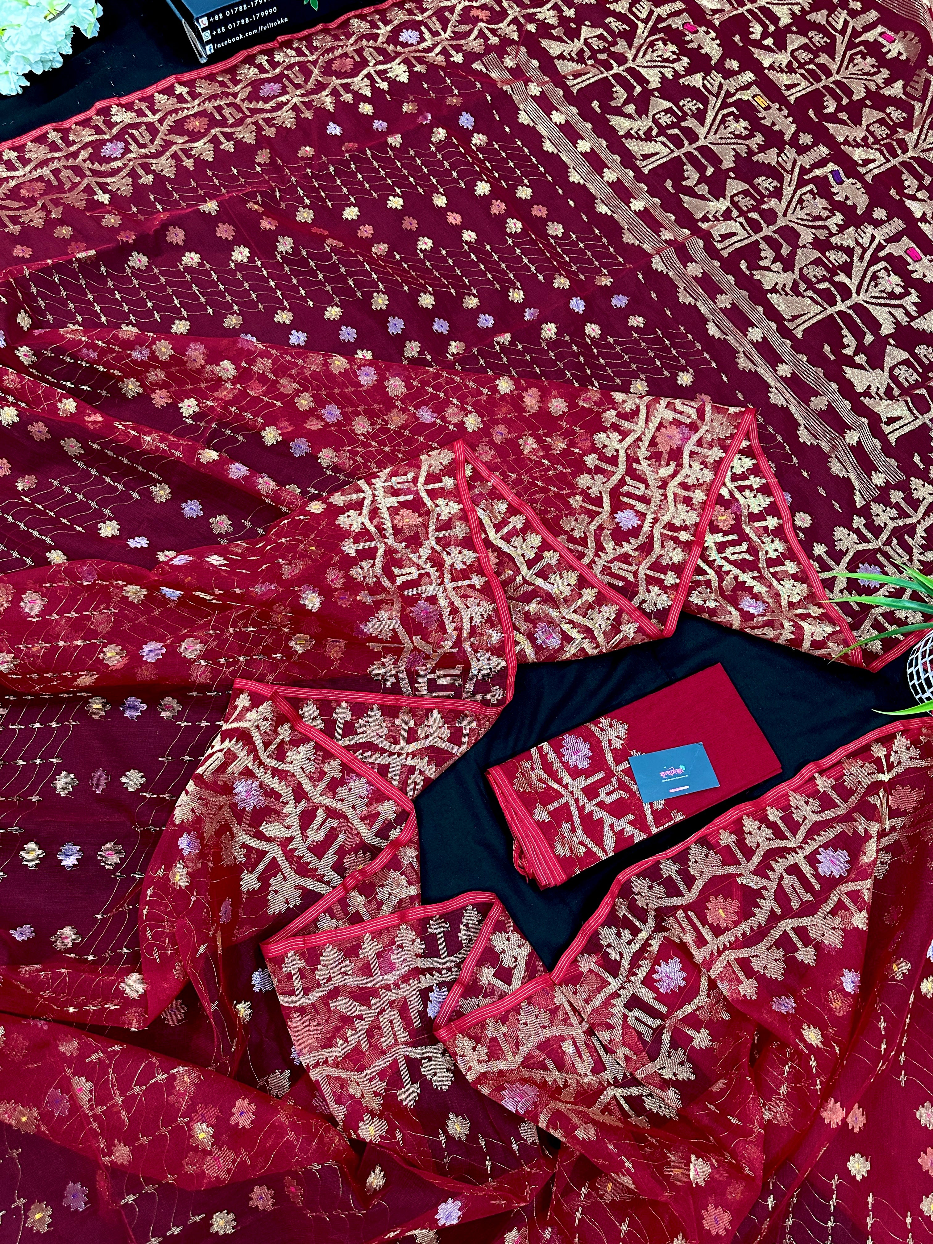 Reddish Maroon Bridal Exclusive dhakai jamdani saree with all over golden jori work soft count.