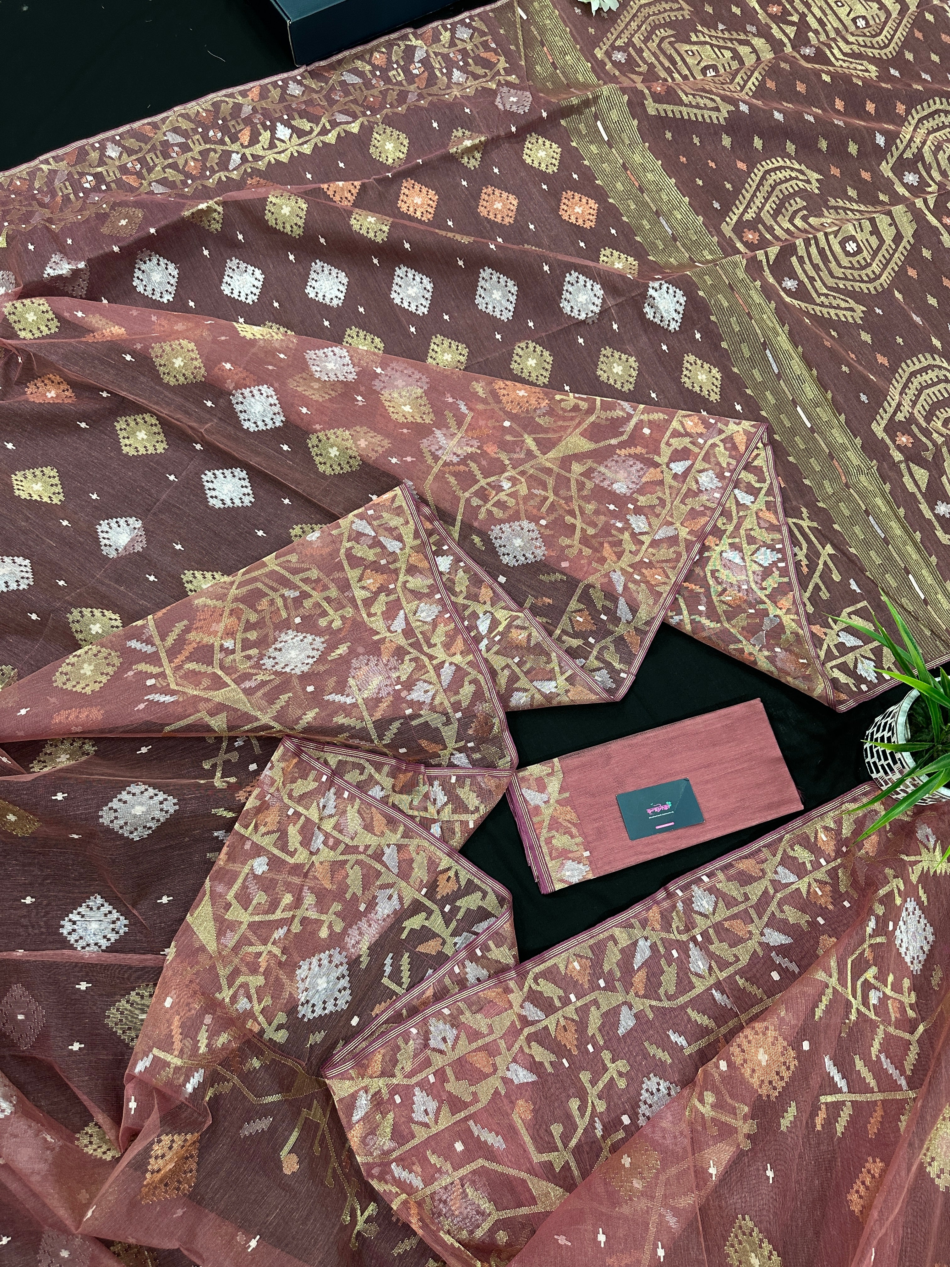 Nude Onion Exclusive Dhakai Jamdani saree with golden silver & copper jori work.