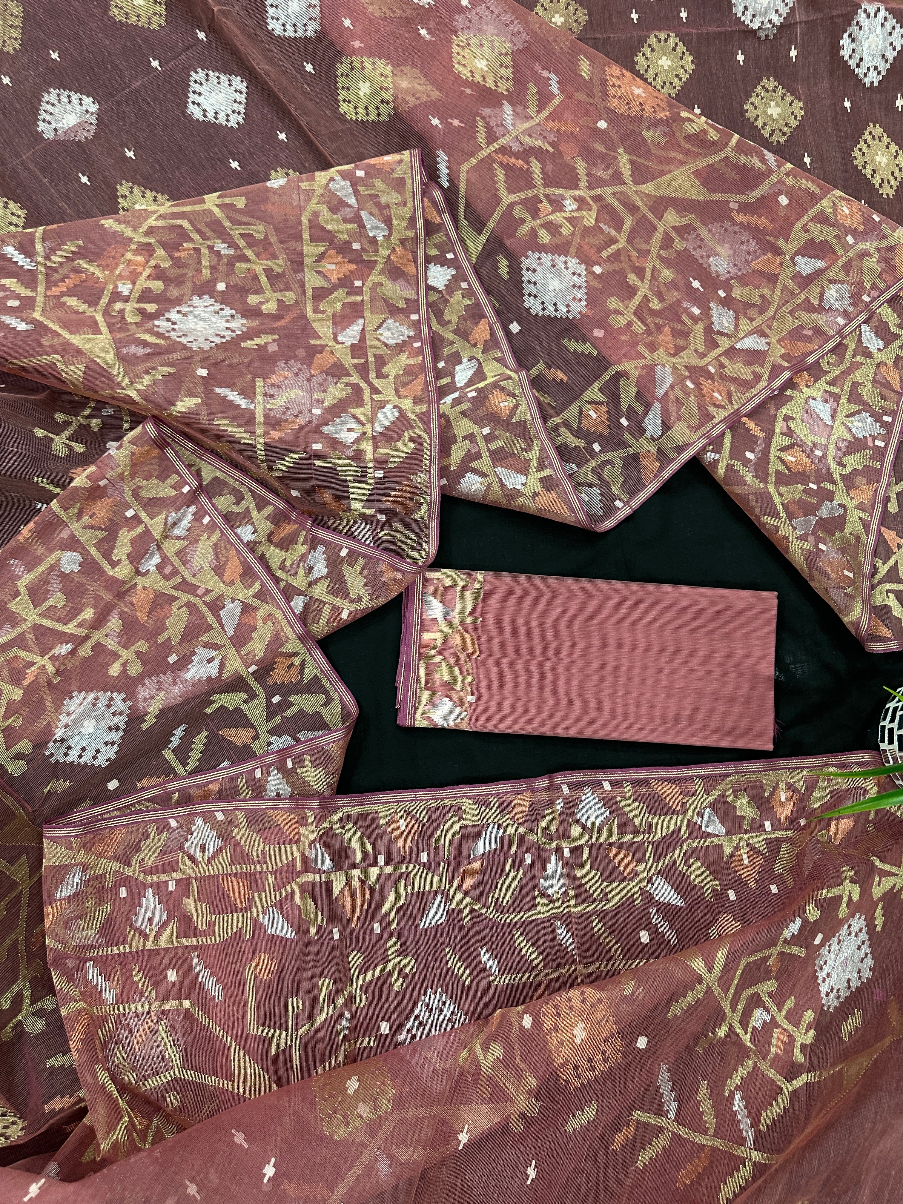 Nude Onion Exclusive Dhakai Jamdani saree with golden silver & copper jori work.