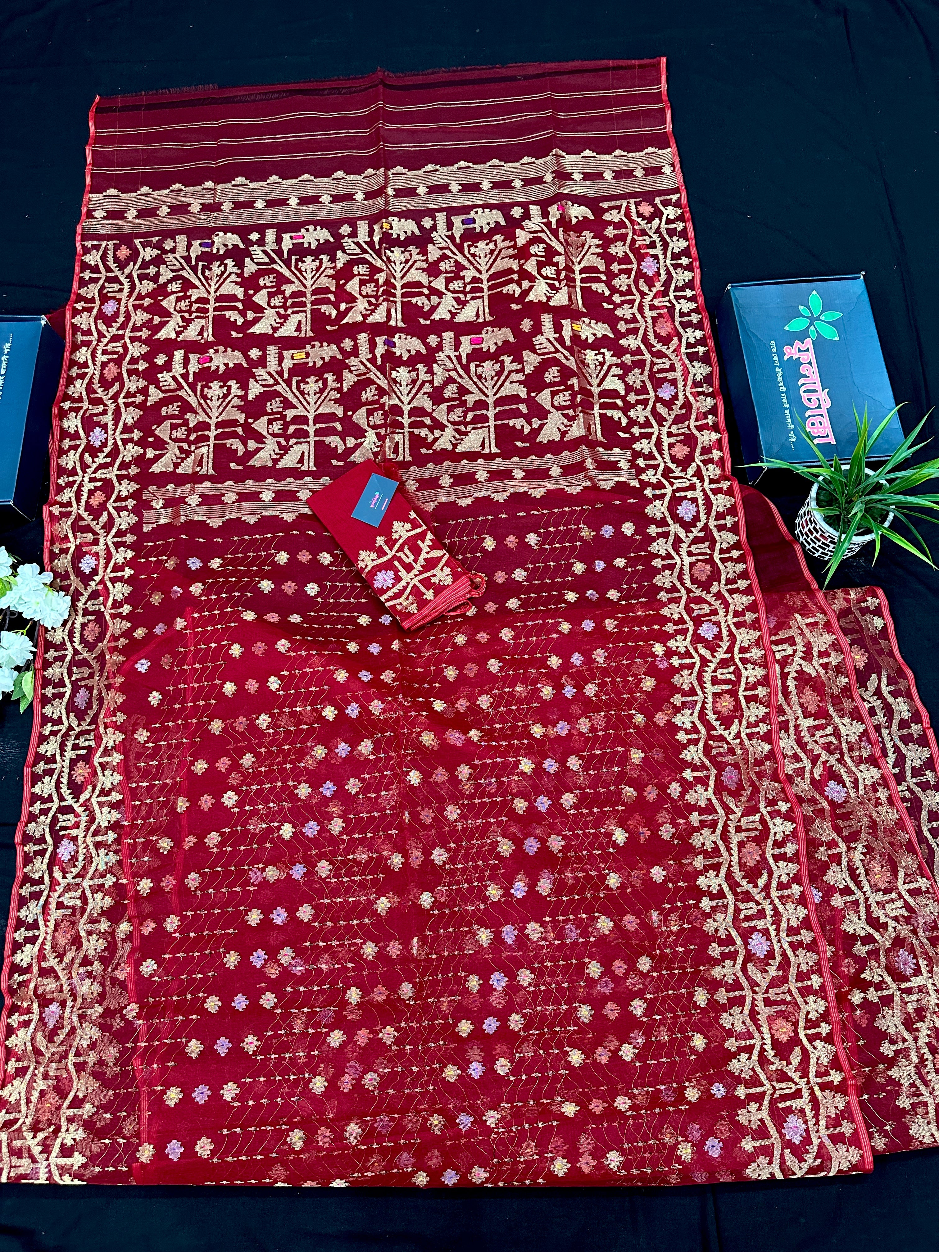 Reddish Maroon Bridal Exclusive dhakai jamdani saree with all over golden jori work soft count.