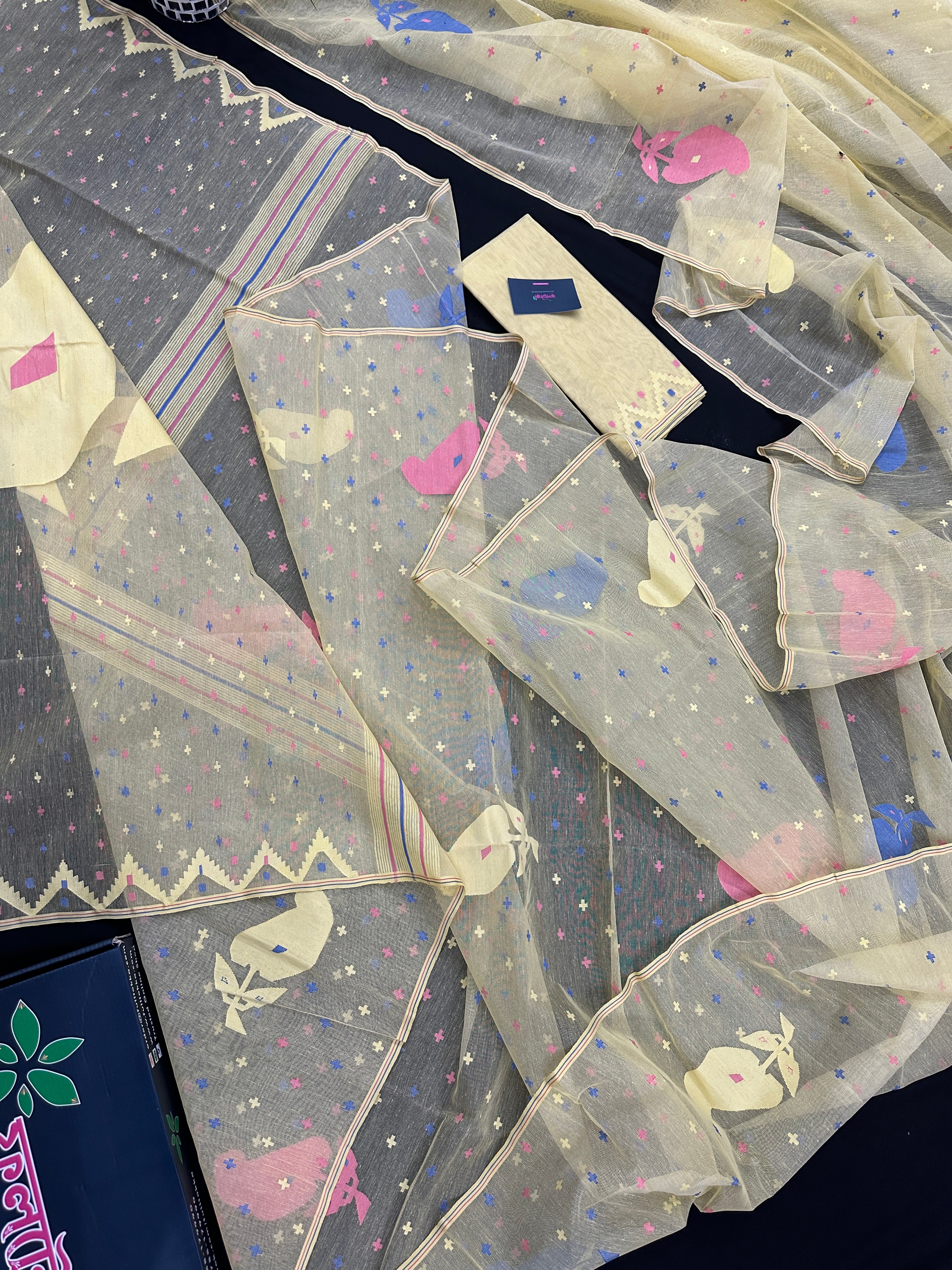 Baby yellow halfsilk jamdani saree with blue pink baby yellow threads work.