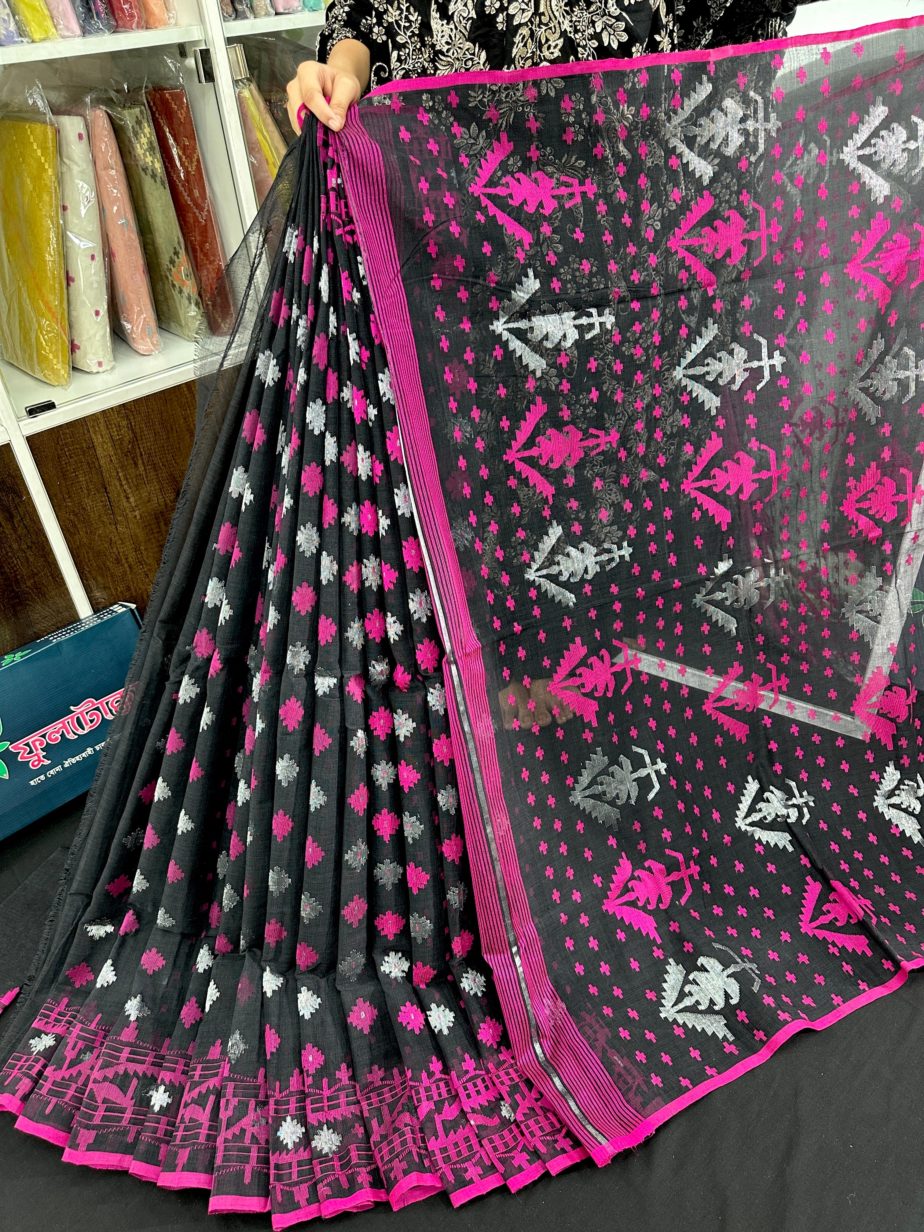 Black cotton jamdani saree with magenta threads work and silver jori work