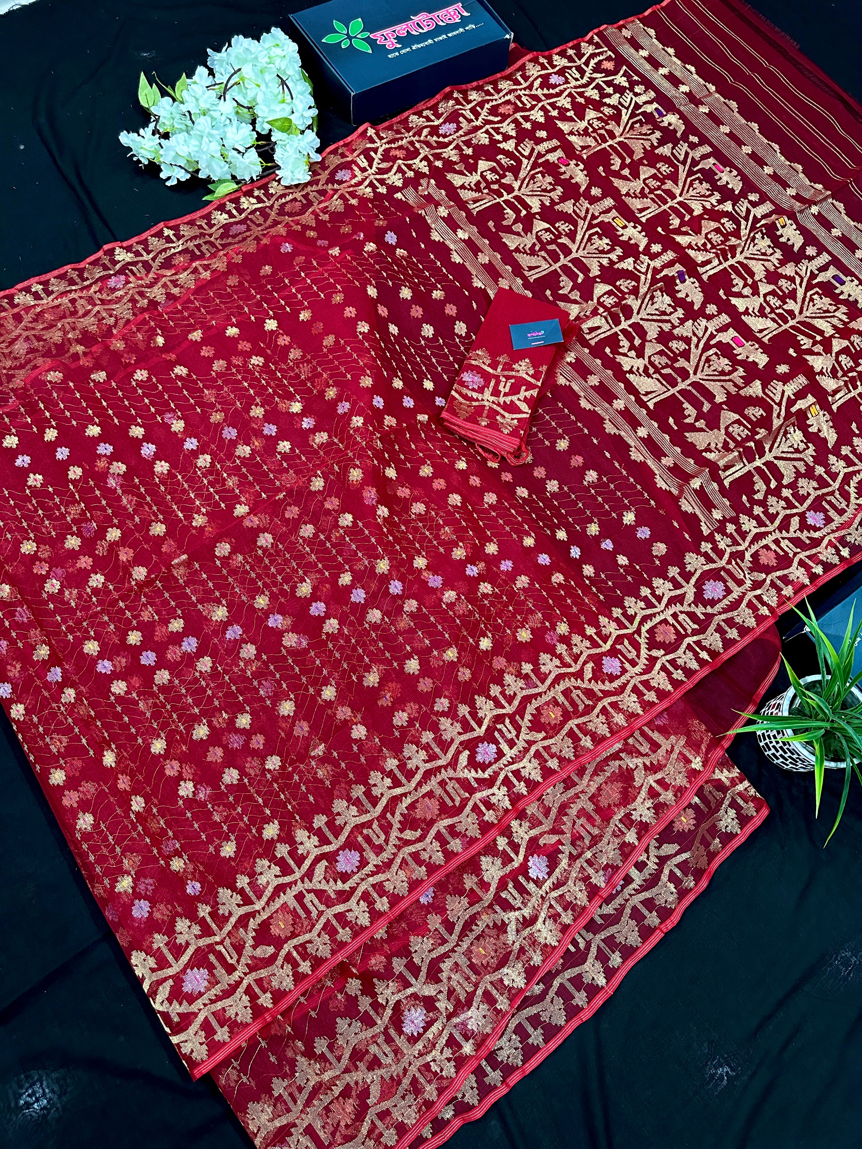 Reddish Maroon Bridal Exclusive dhakai jamdani saree with all over golden jori work soft count.