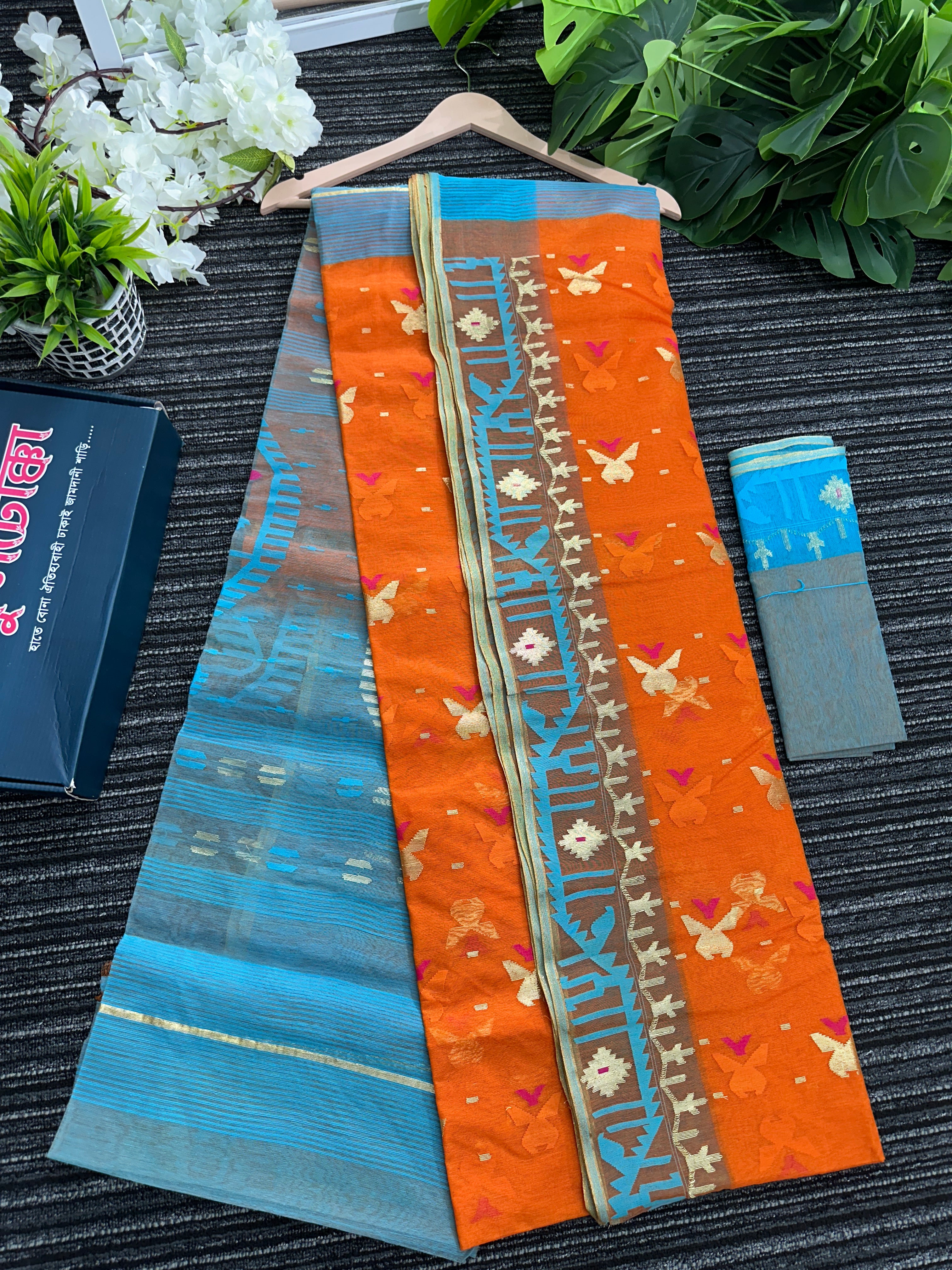 Fanta orange halfsilk jamdani saree with golden jori work and blue orange threads work
