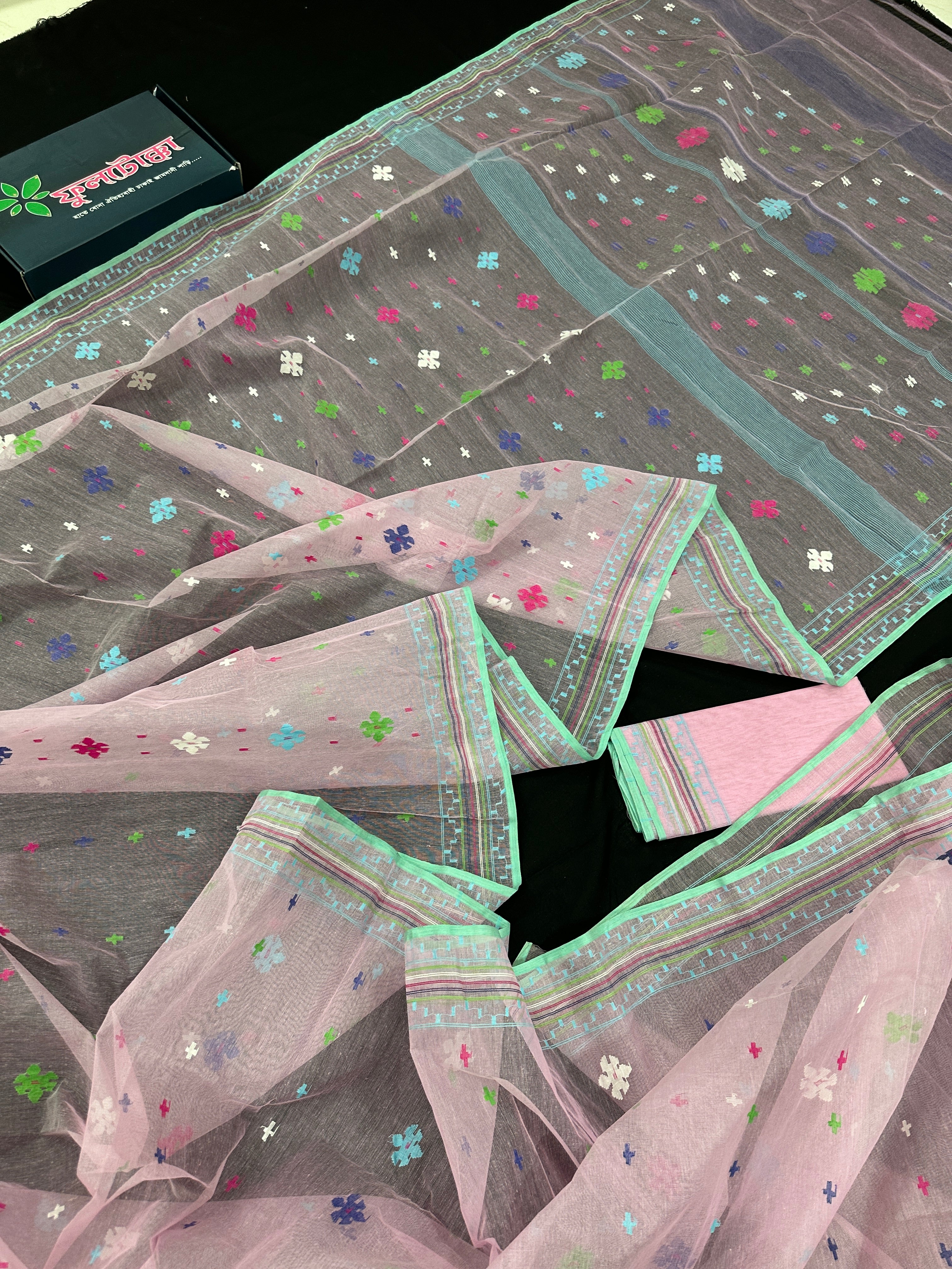 Baby pink jamdani saree with blue pink green threats work and blouse piece.