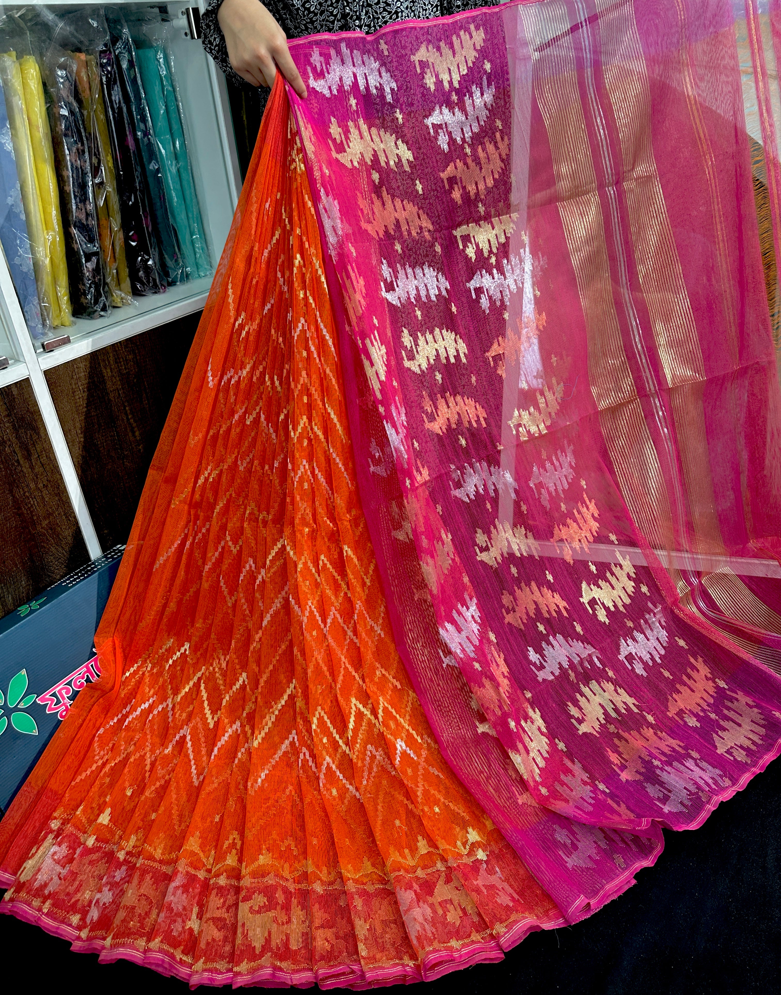 Orange halfsilk jamdani with magenta paar and golden silver & copper jori work