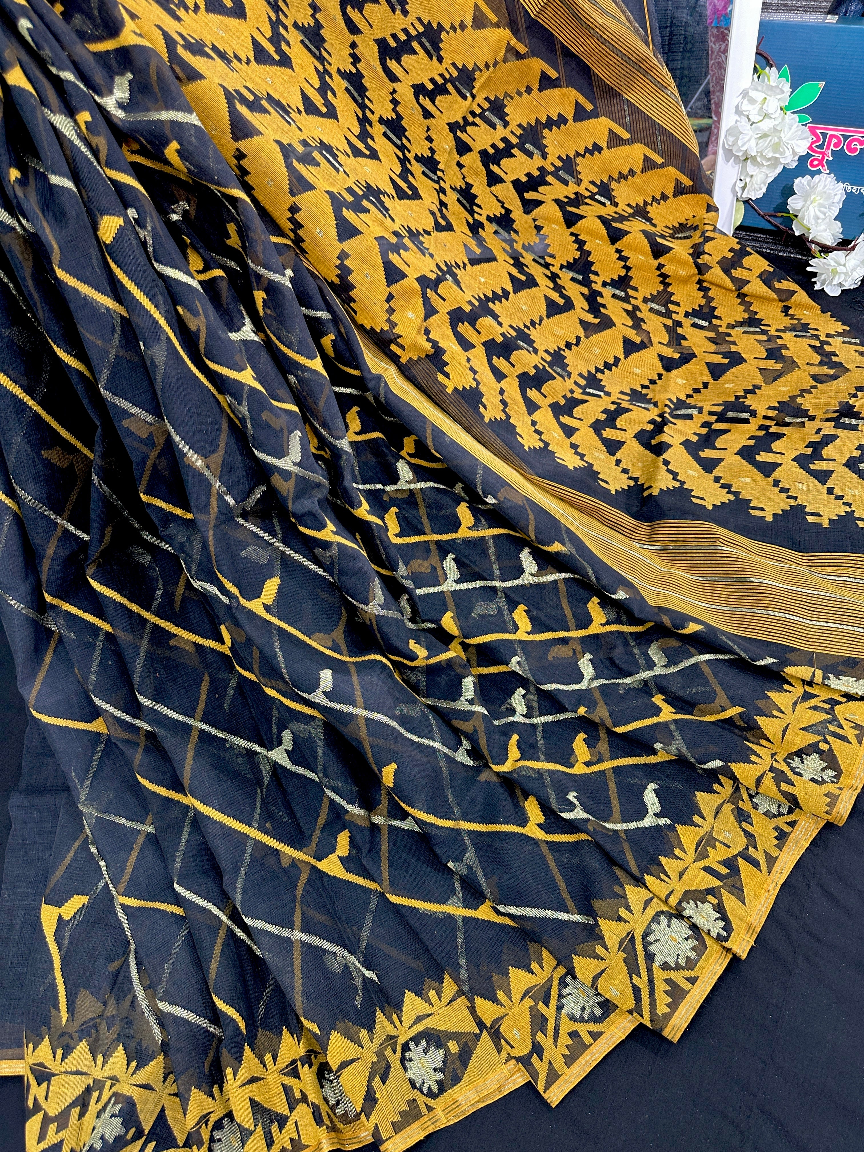 Black cotton jamdani saree with yellow threads work and Silver jori work & blouse piece.