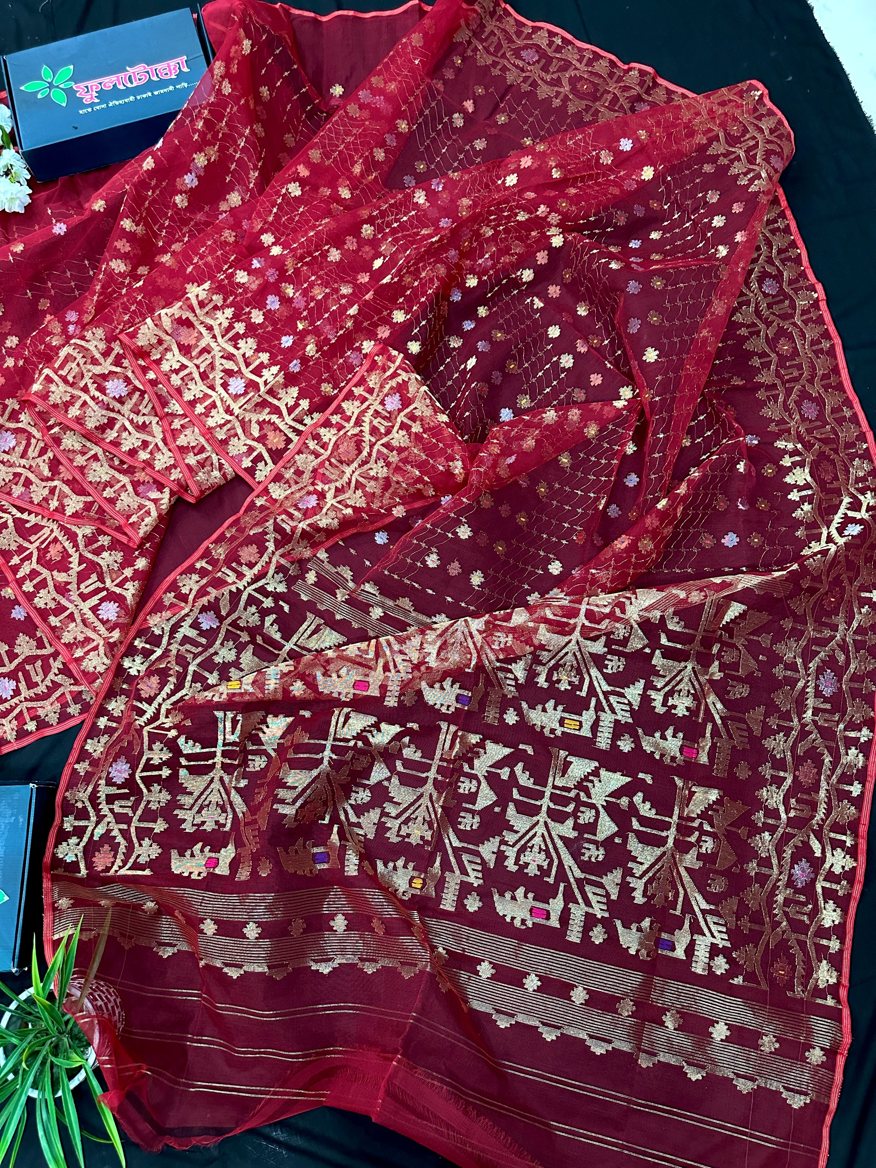 Reddish Maroon Bridal Exclusive dhakai jamdani saree with all over golden jori work soft count.