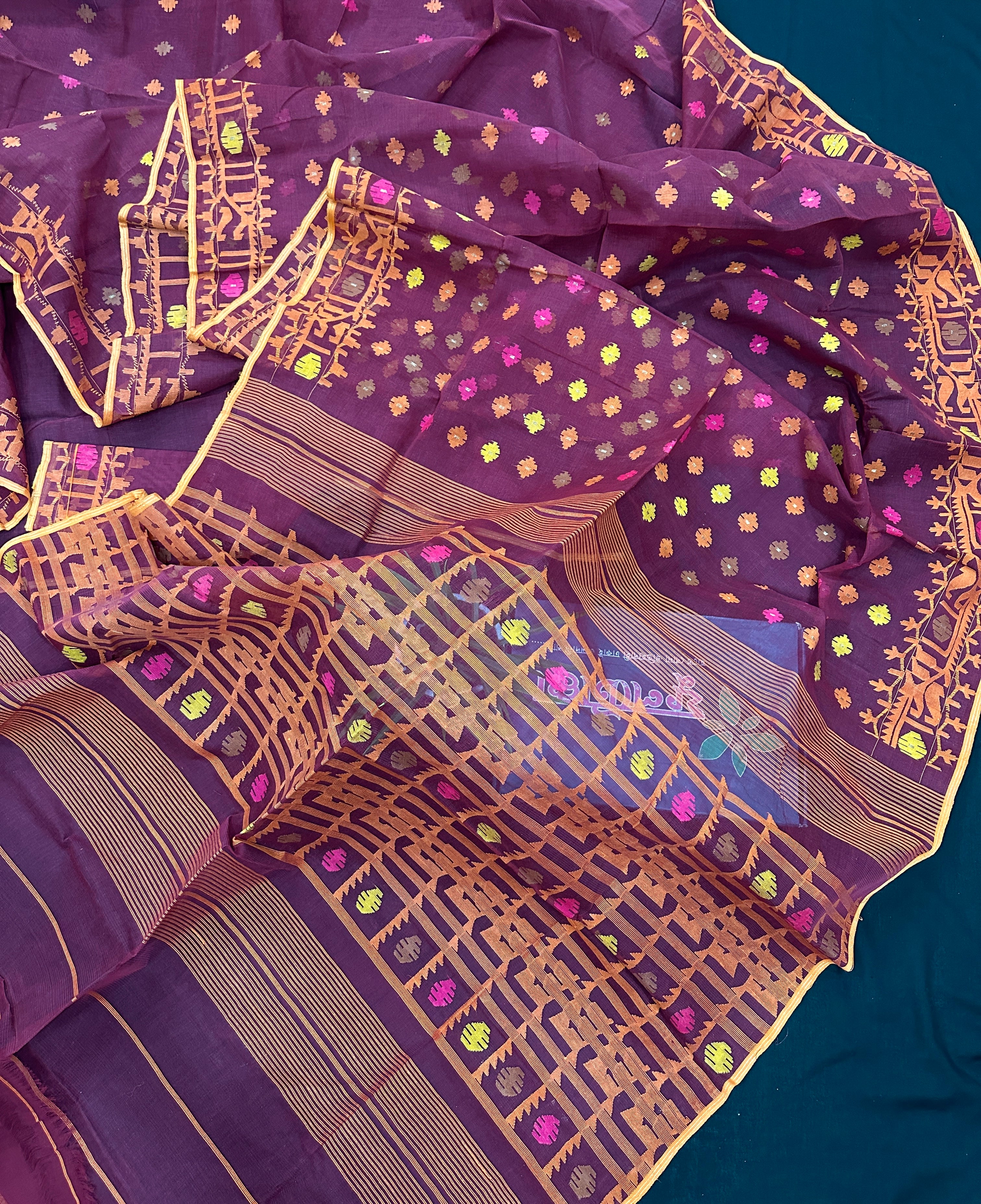 Bitrut colour cotton jamdani saree with yellow orange and pink threads work & blouse piece.