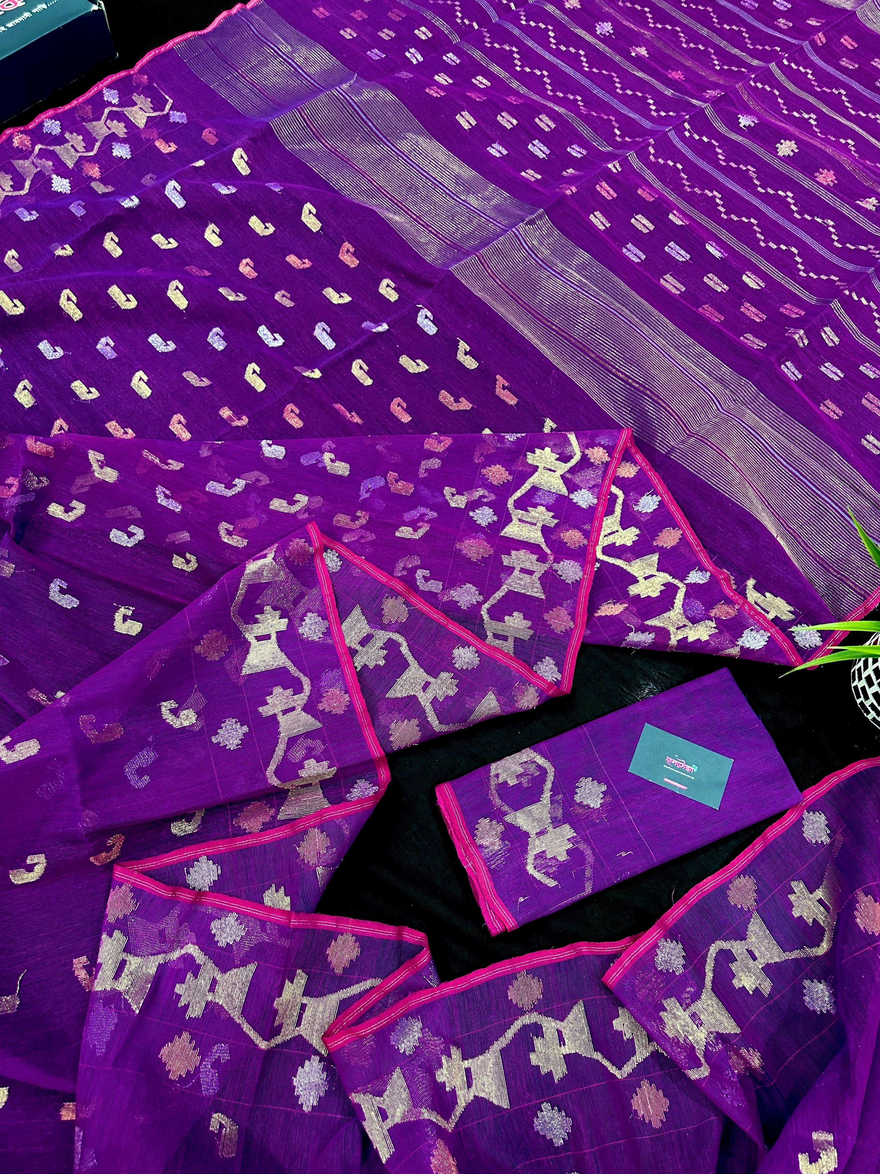 Purple dual toned jamdani saree with golden silver and copper jori work.