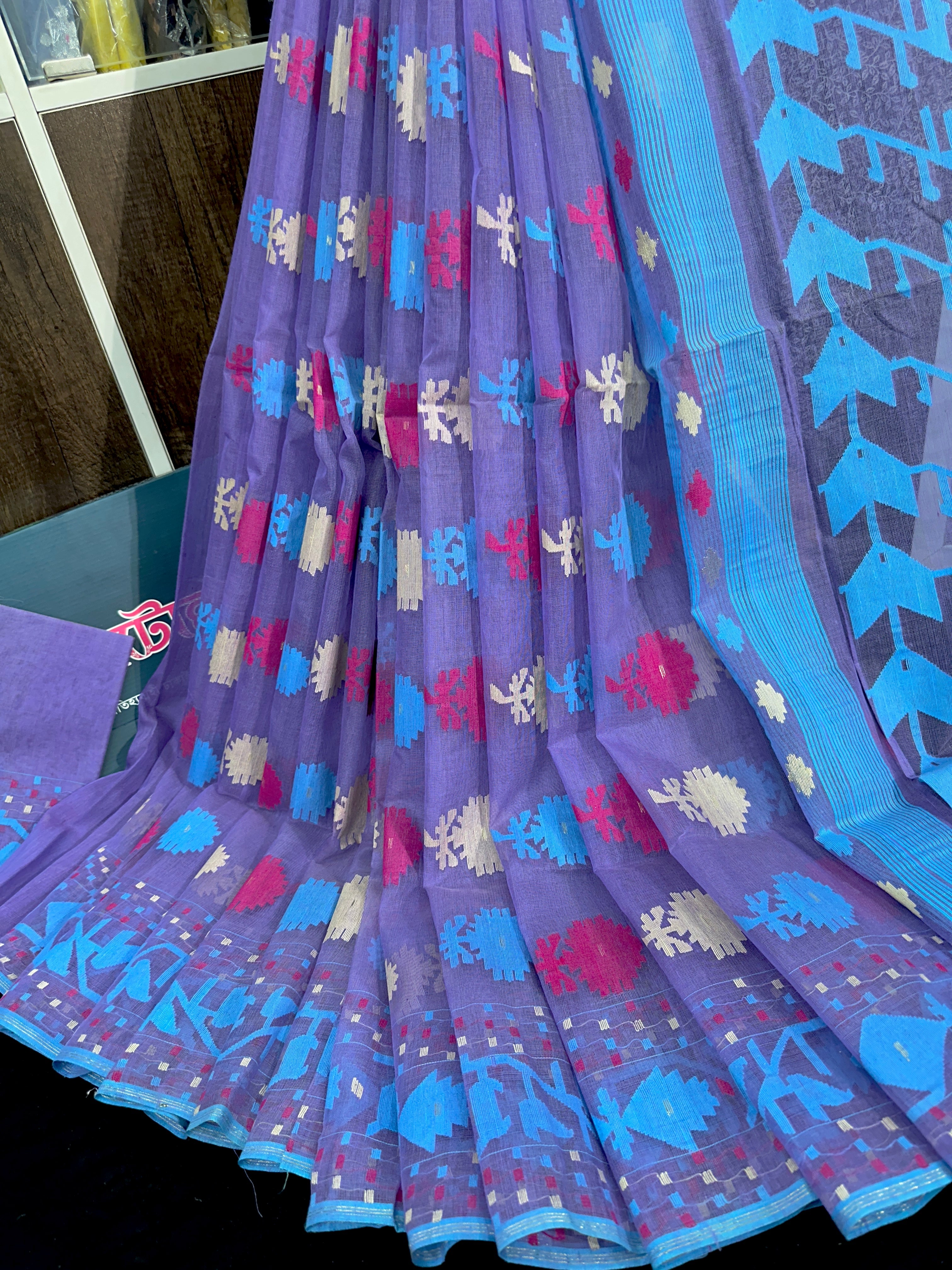 Orchid purple halfsilk jamdani saree with white pink blue threads work