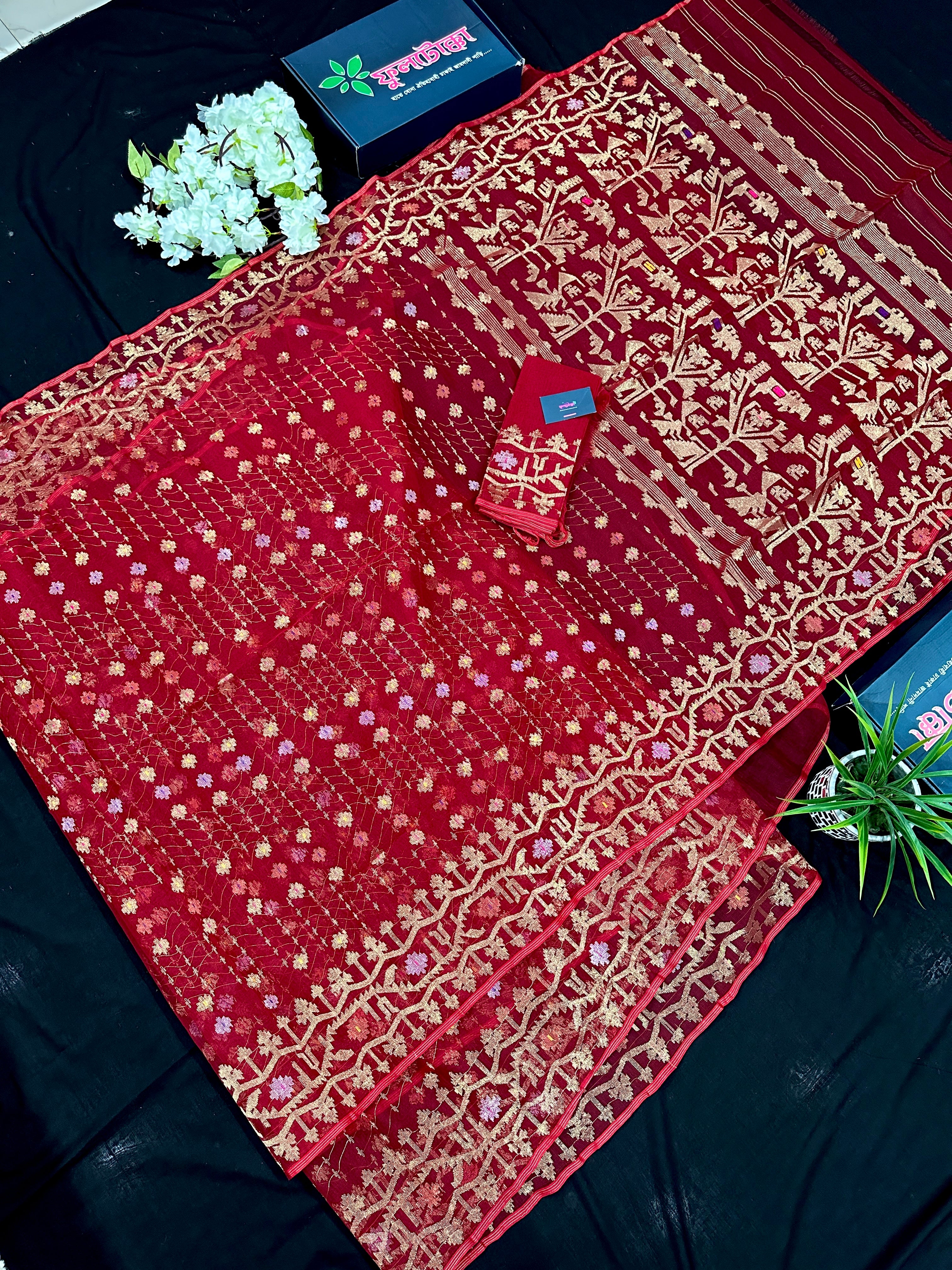 Reddish Maroon Bridal Exclusive dhakai jamdani saree with all over golden jori work soft count.