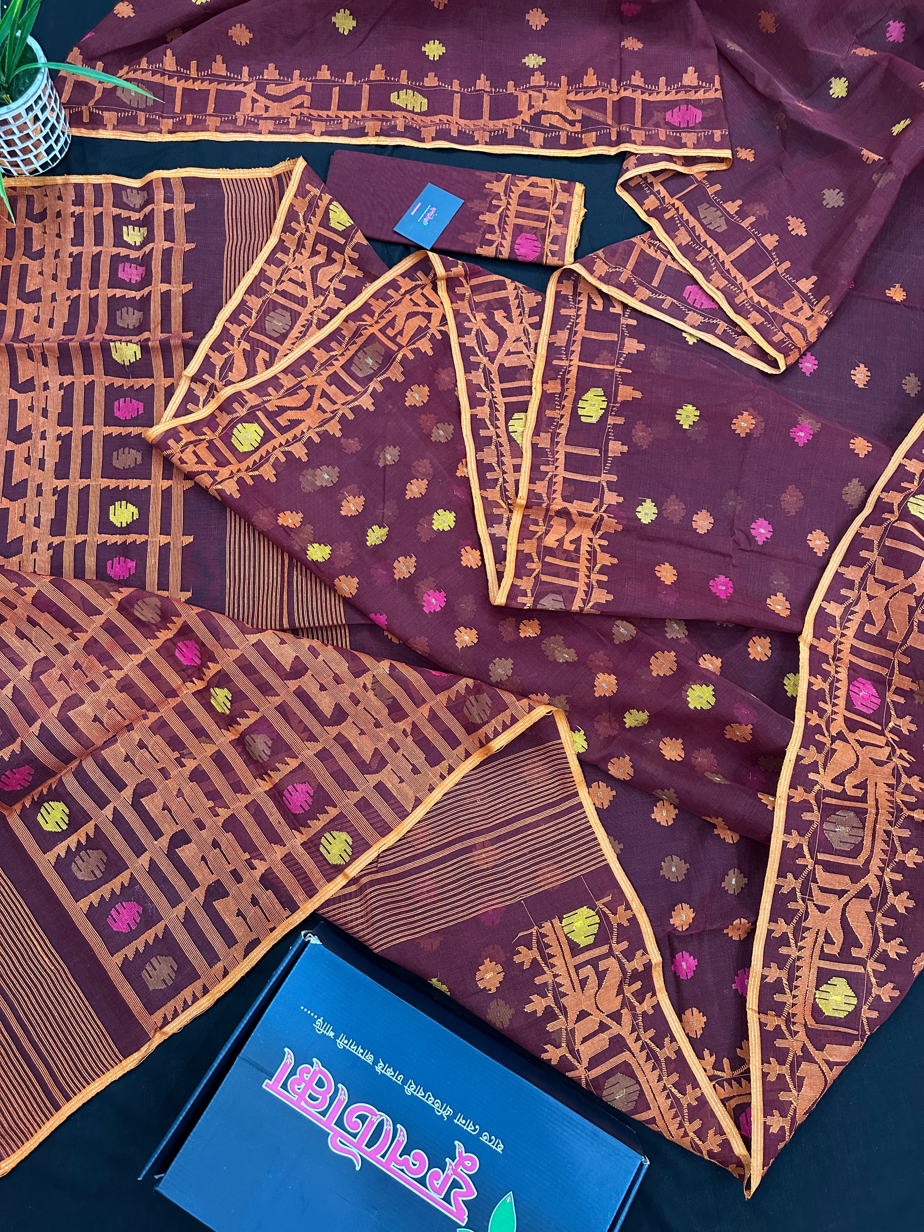 Bitrut colour cotton jamdani saree with yellow orange and pink threads work & blouse piece.