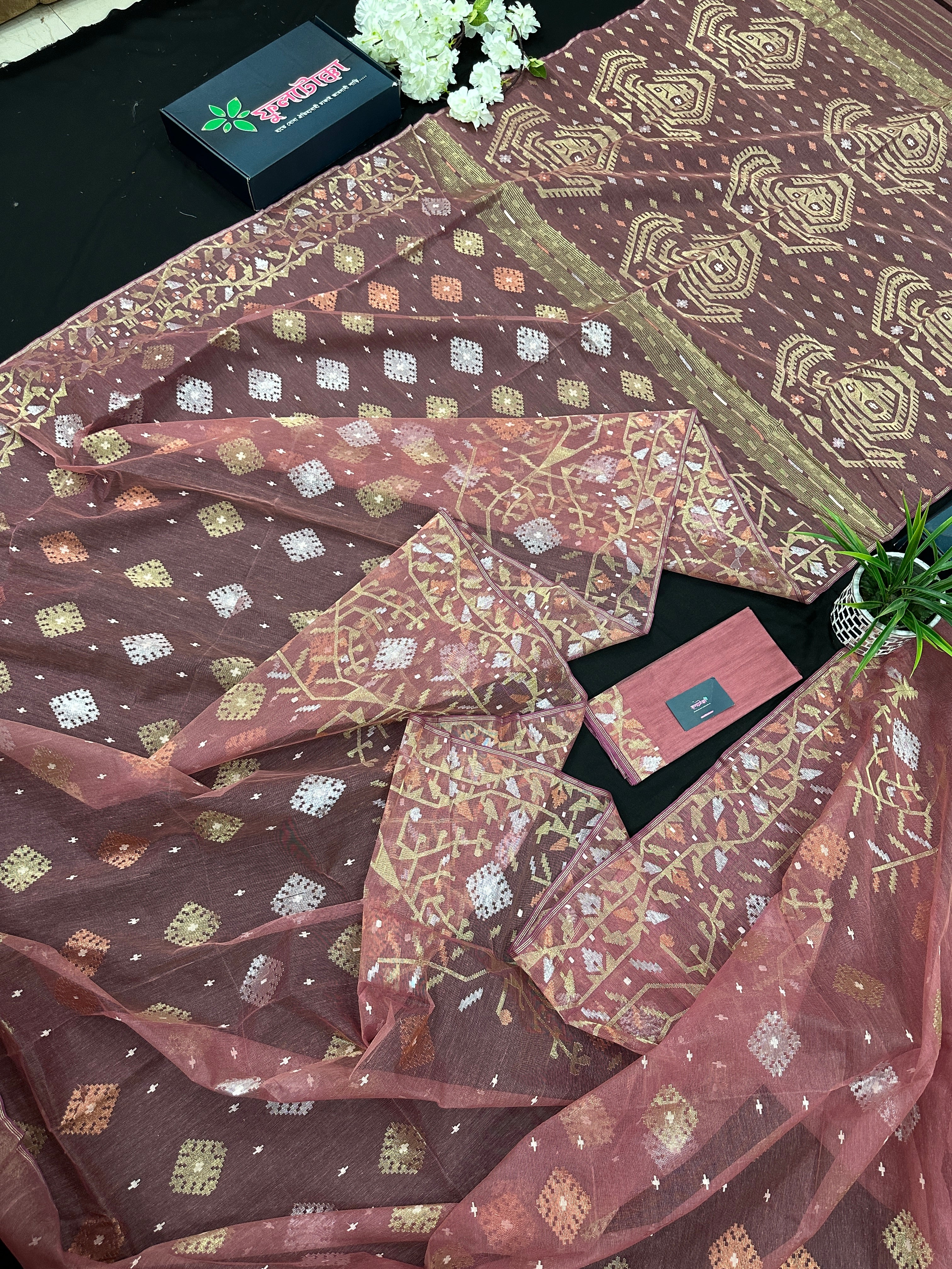 Nude Onion Exclusive Dhakai Jamdani saree with golden silver & copper jori work.