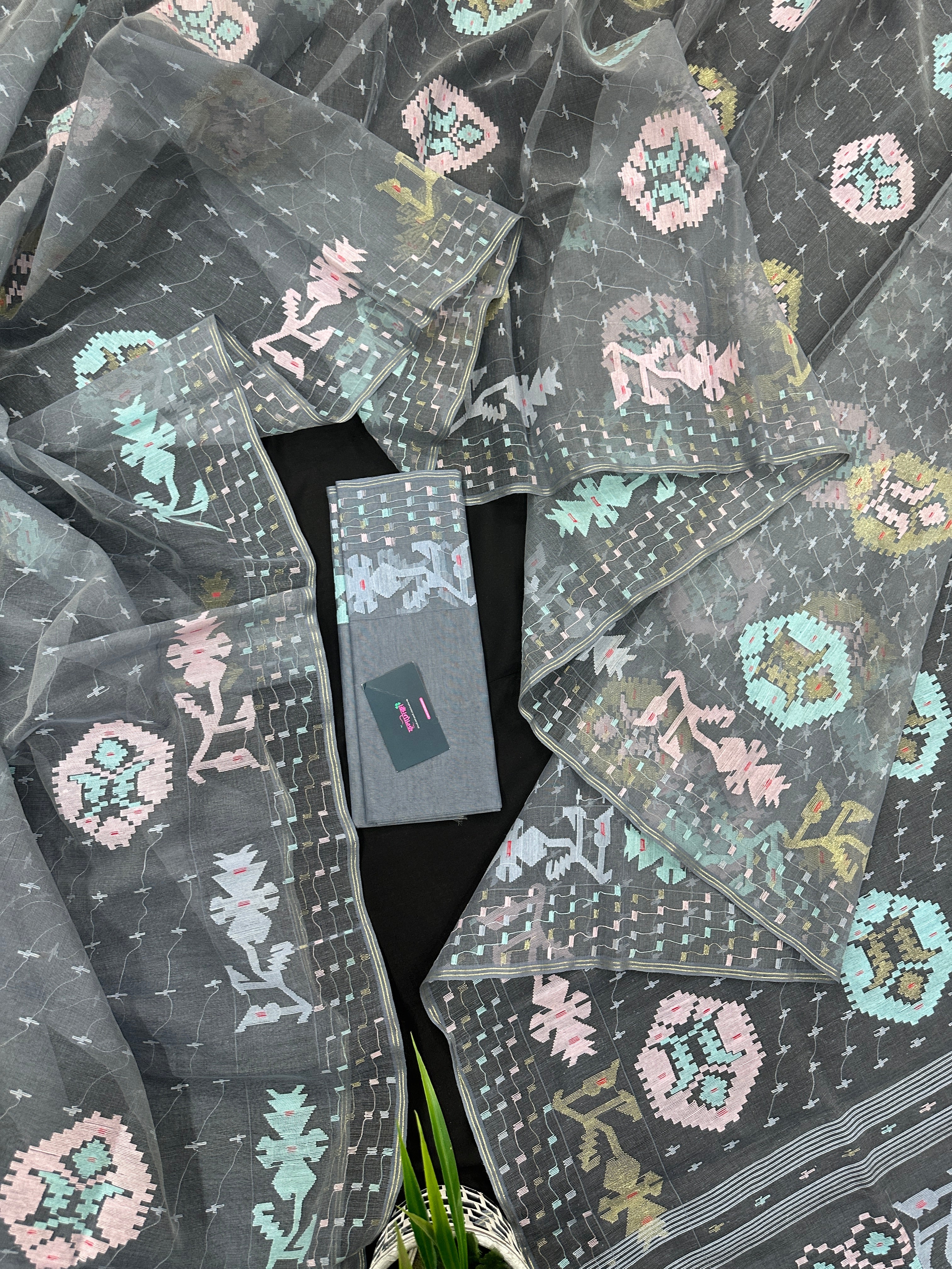 Ash jamdani saree with pink blue and with threads work and golden jori work.