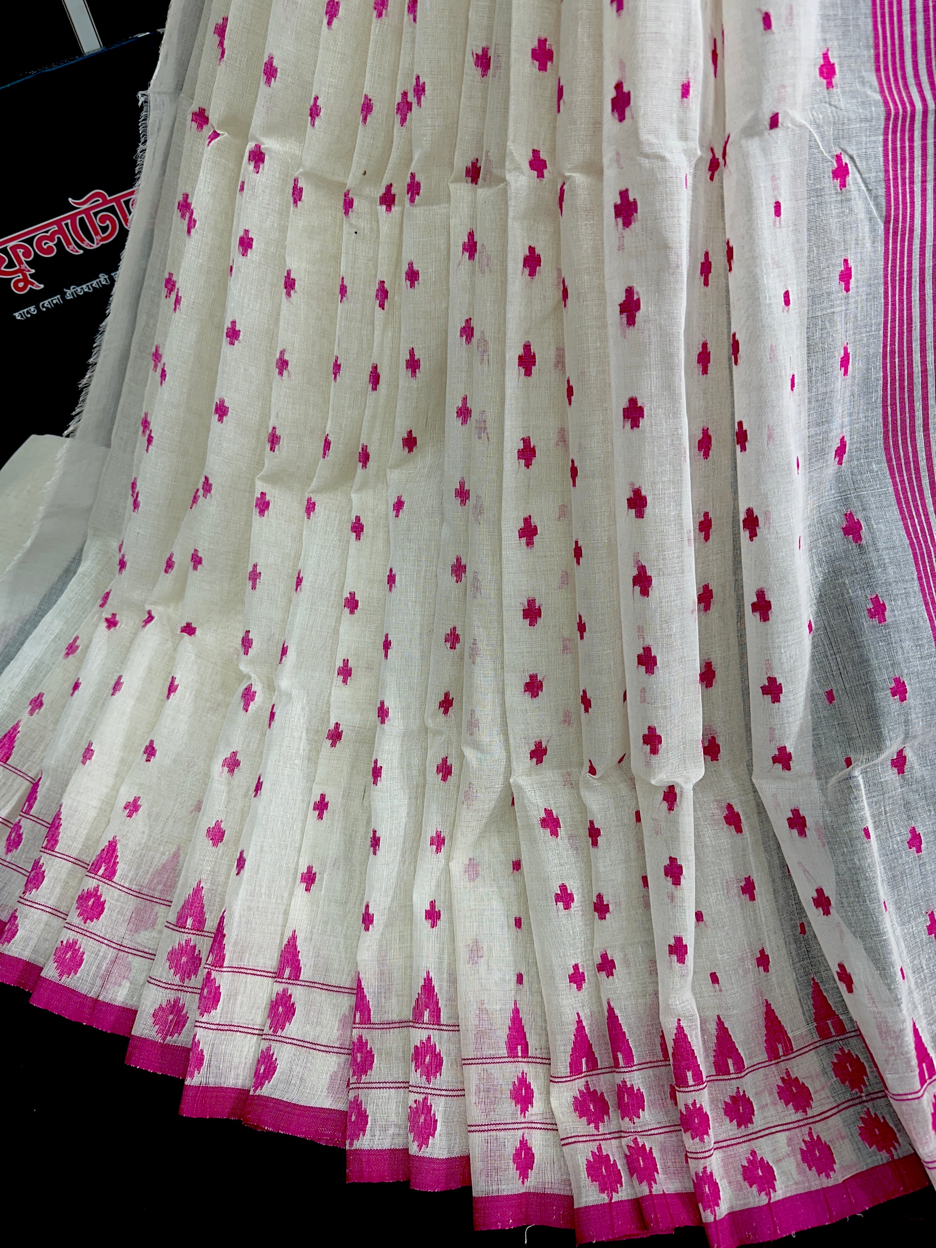 White cotton jamdani saree with pink buta and pink threads work