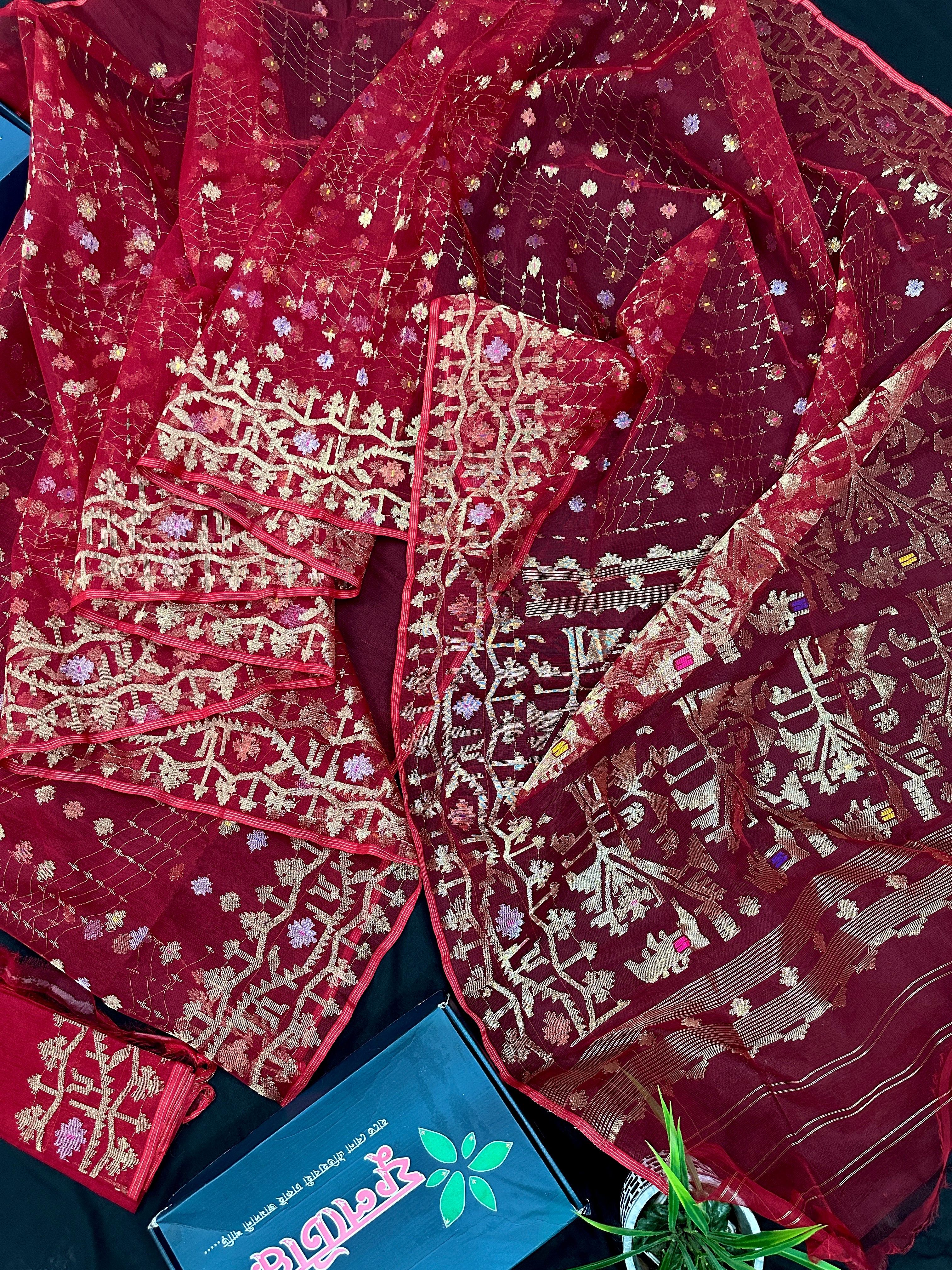 Reddish Maroon Bridal Exclusive dhakai jamdani saree with all over golden jori work soft count.