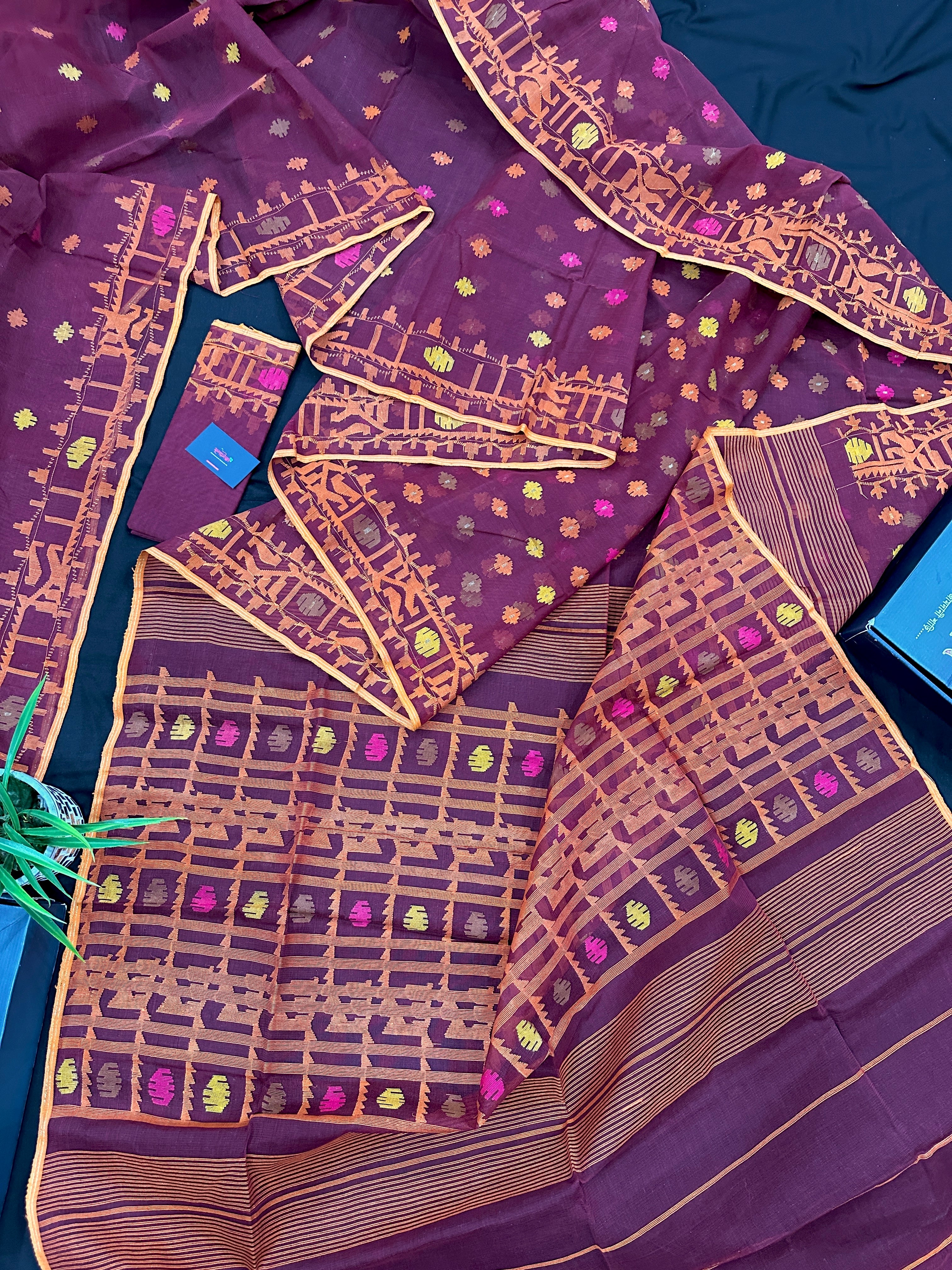 Bitrut colour cotton jamdani saree with yellow orange and pink threads work & blouse piece.