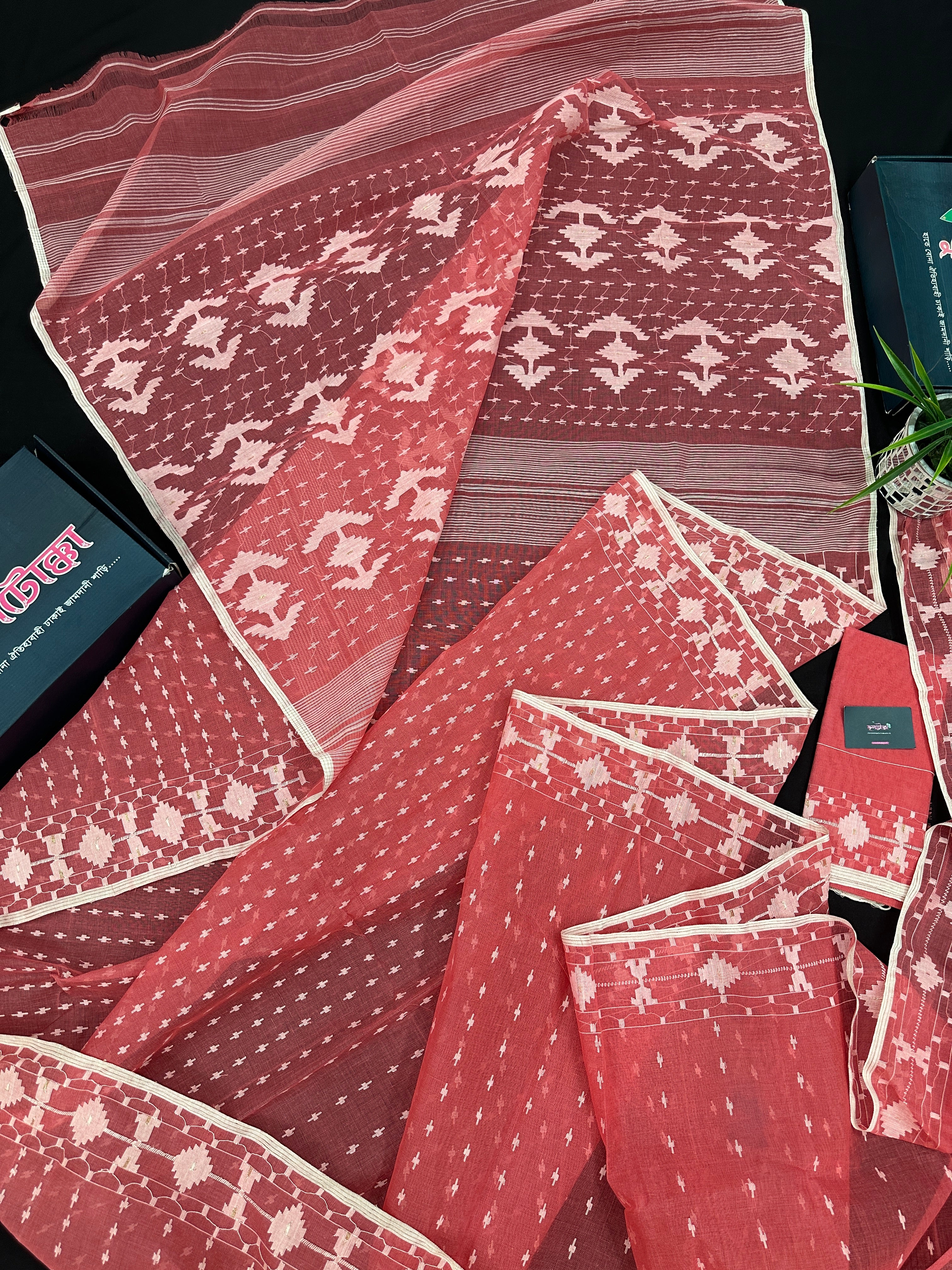 Sweet pink cotton jamdani saree with white threads work and blouse piece.