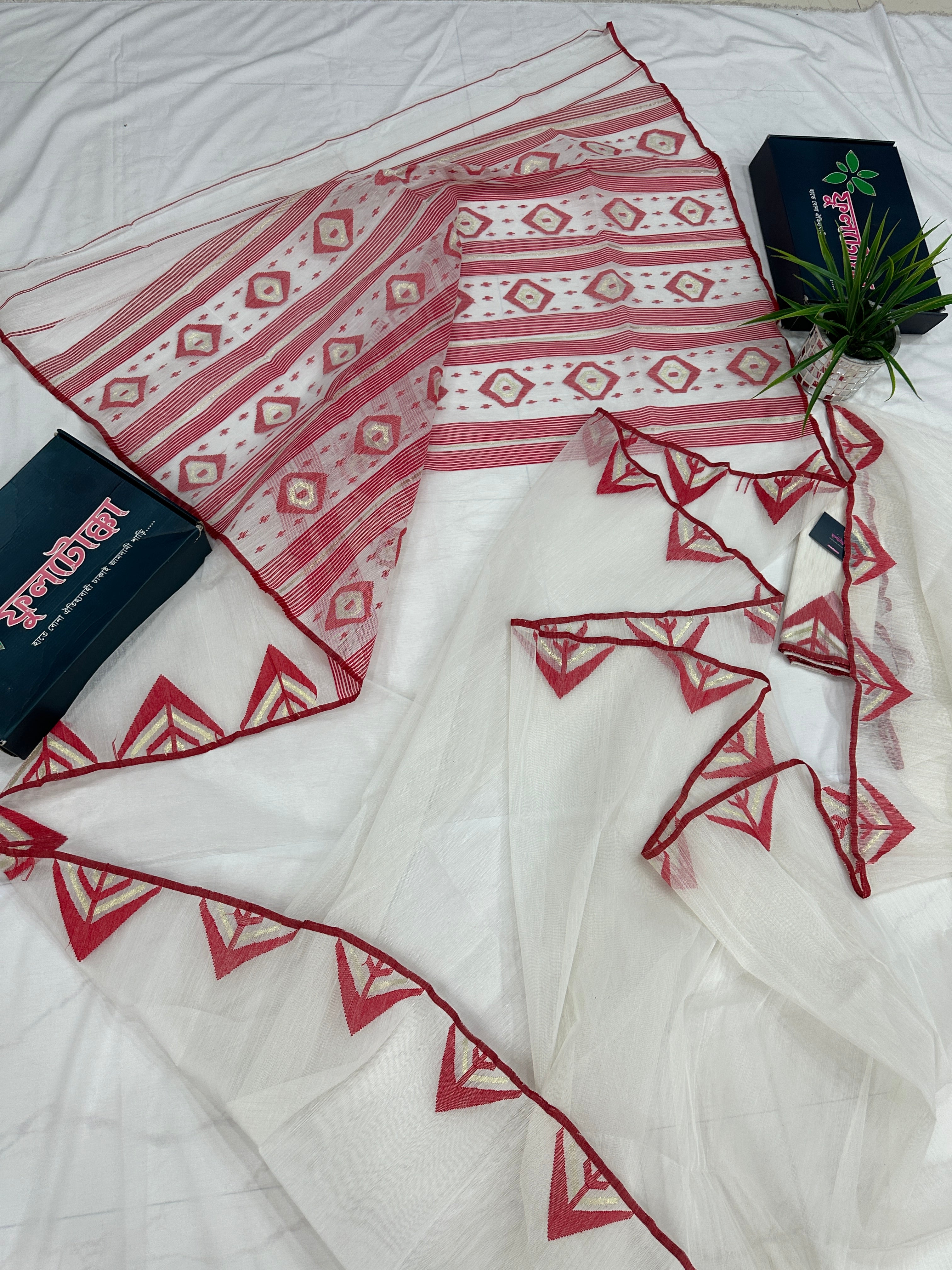 White Jamdani Saree With Red Paar.
