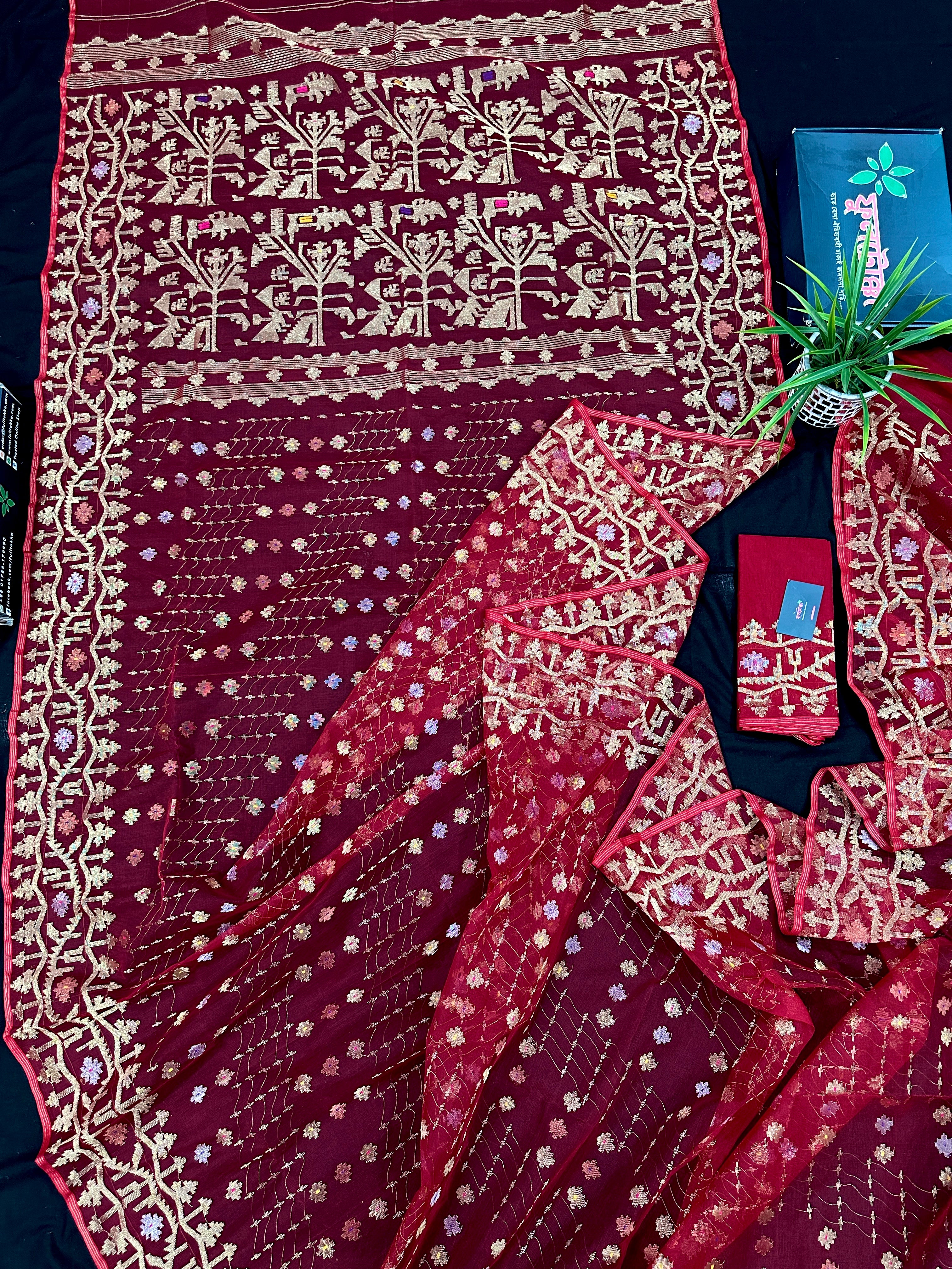 Reddish Maroon Bridal Exclusive dhakai jamdani saree with all over golden jori work soft count.