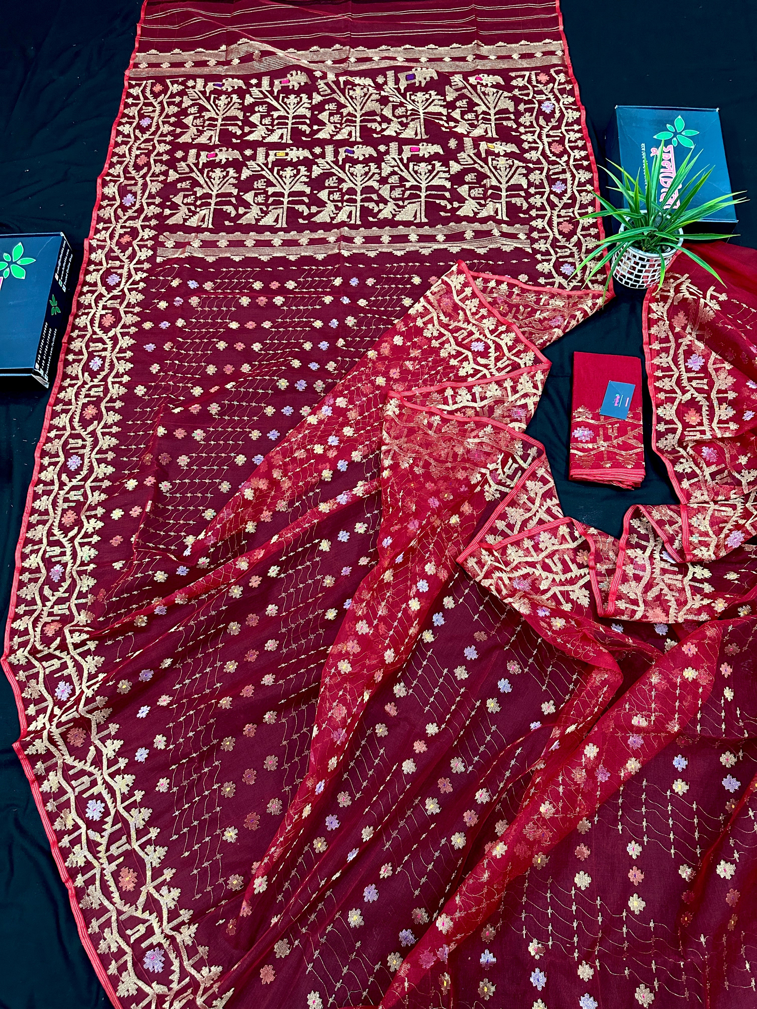Reddish Maroon Bridal Exclusive dhakai jamdani saree with all over golden jori work soft count.