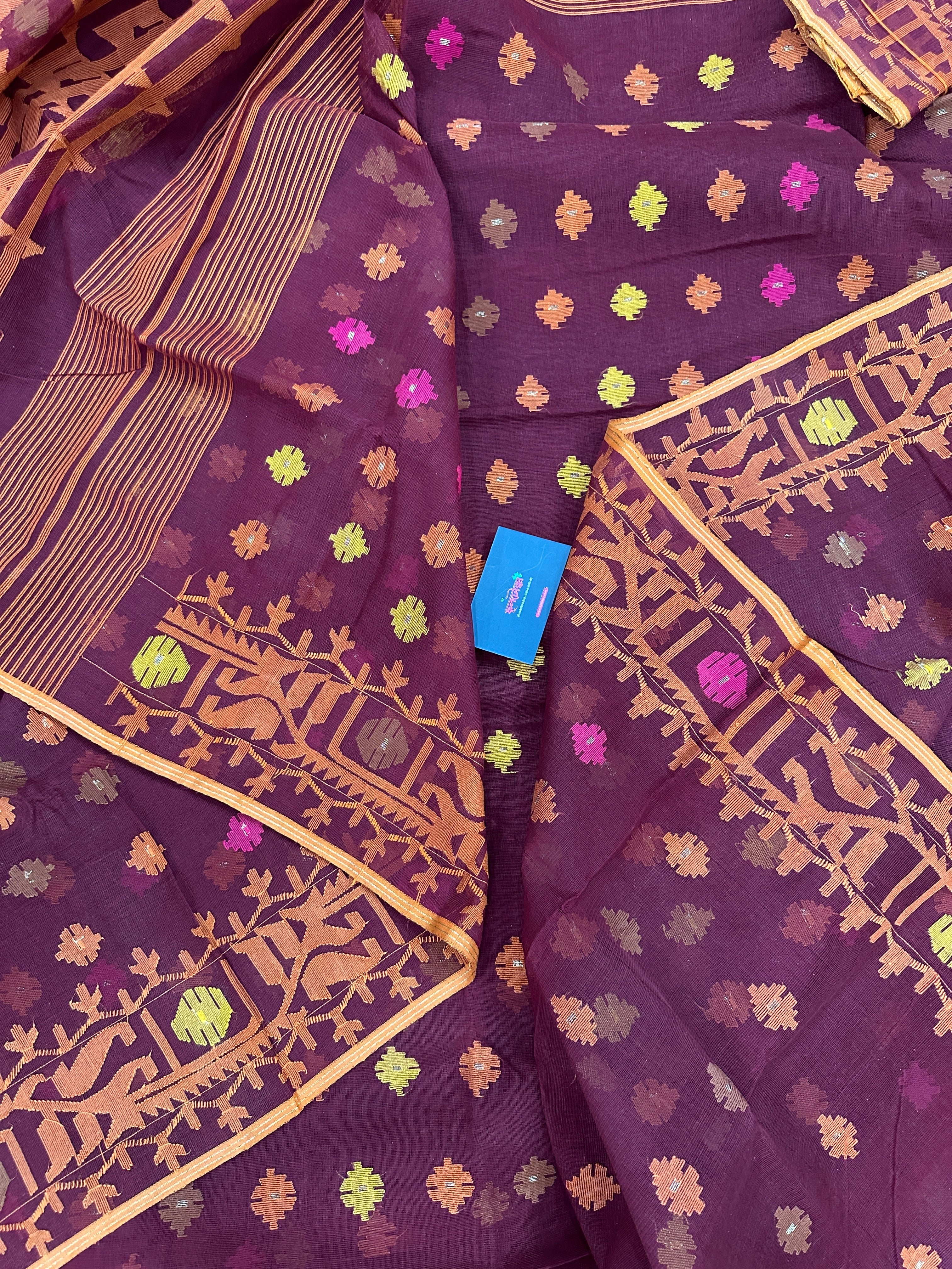 Bitrut colour cotton jamdani saree with yellow orange and pink threads work & blouse piece.