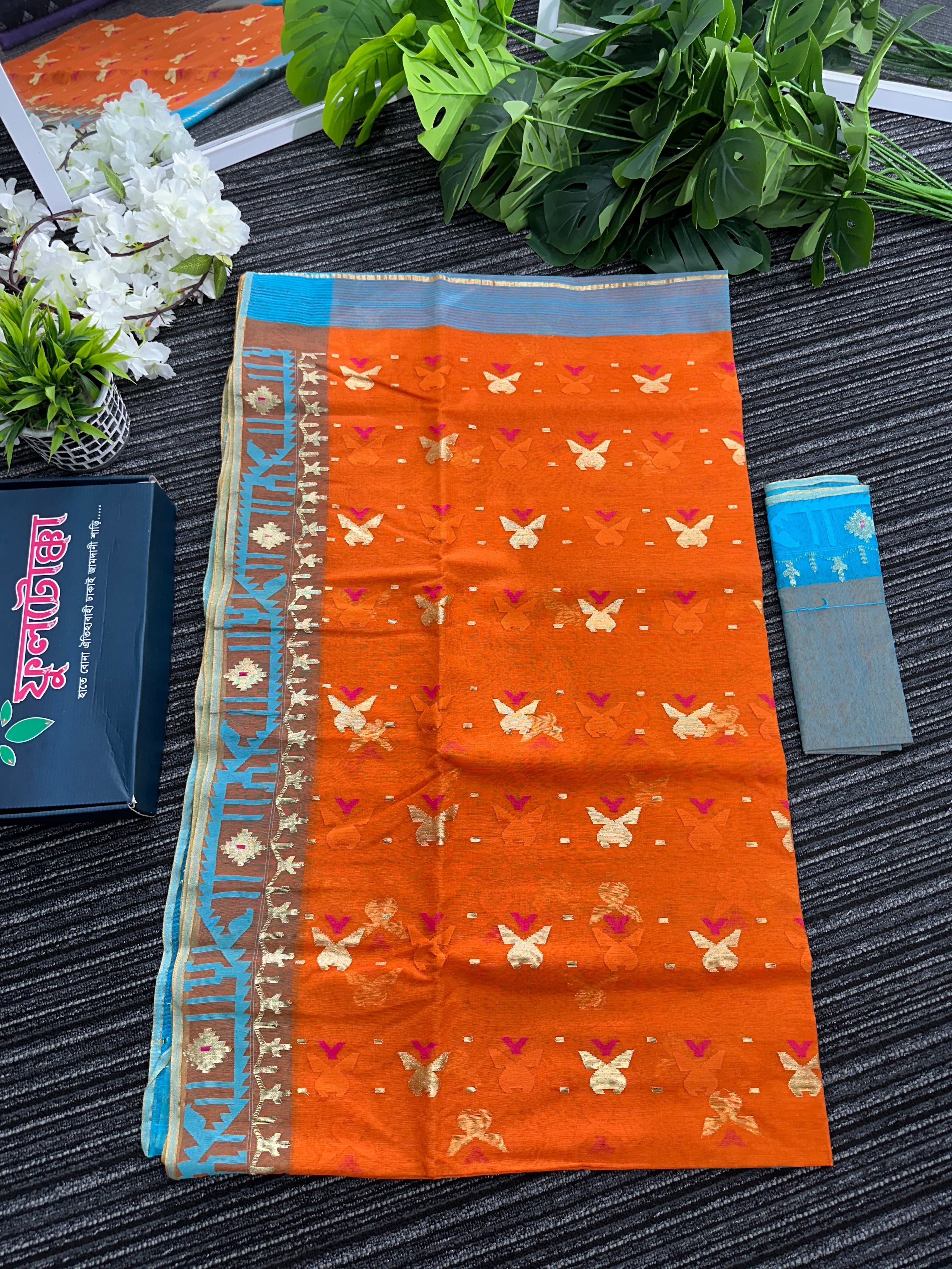 Fanta orange halfsilk jamdani saree with golden jori work and blue orange threads work