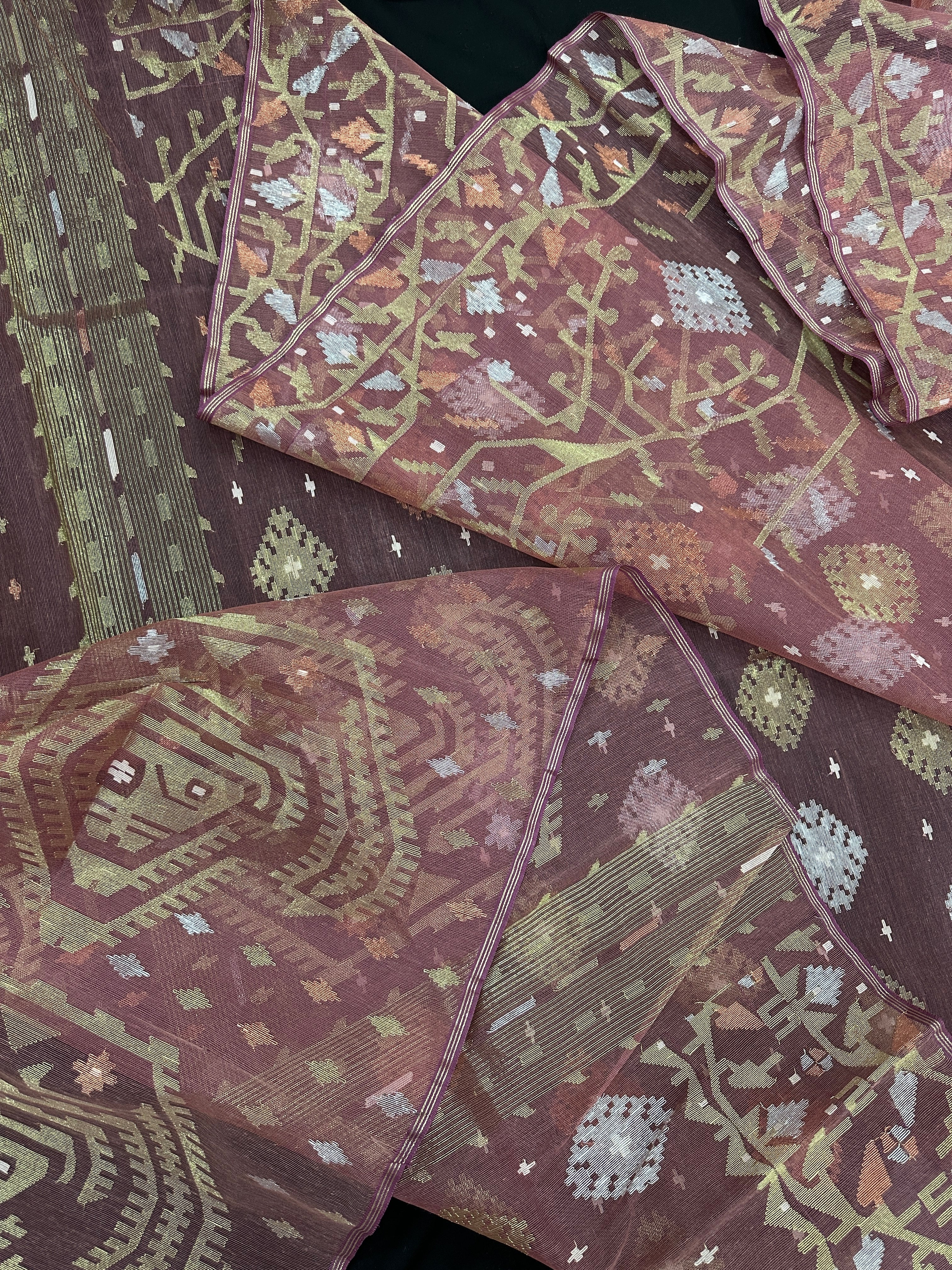 Nude Onion Exclusive Dhakai Jamdani saree with golden silver & copper jori work.