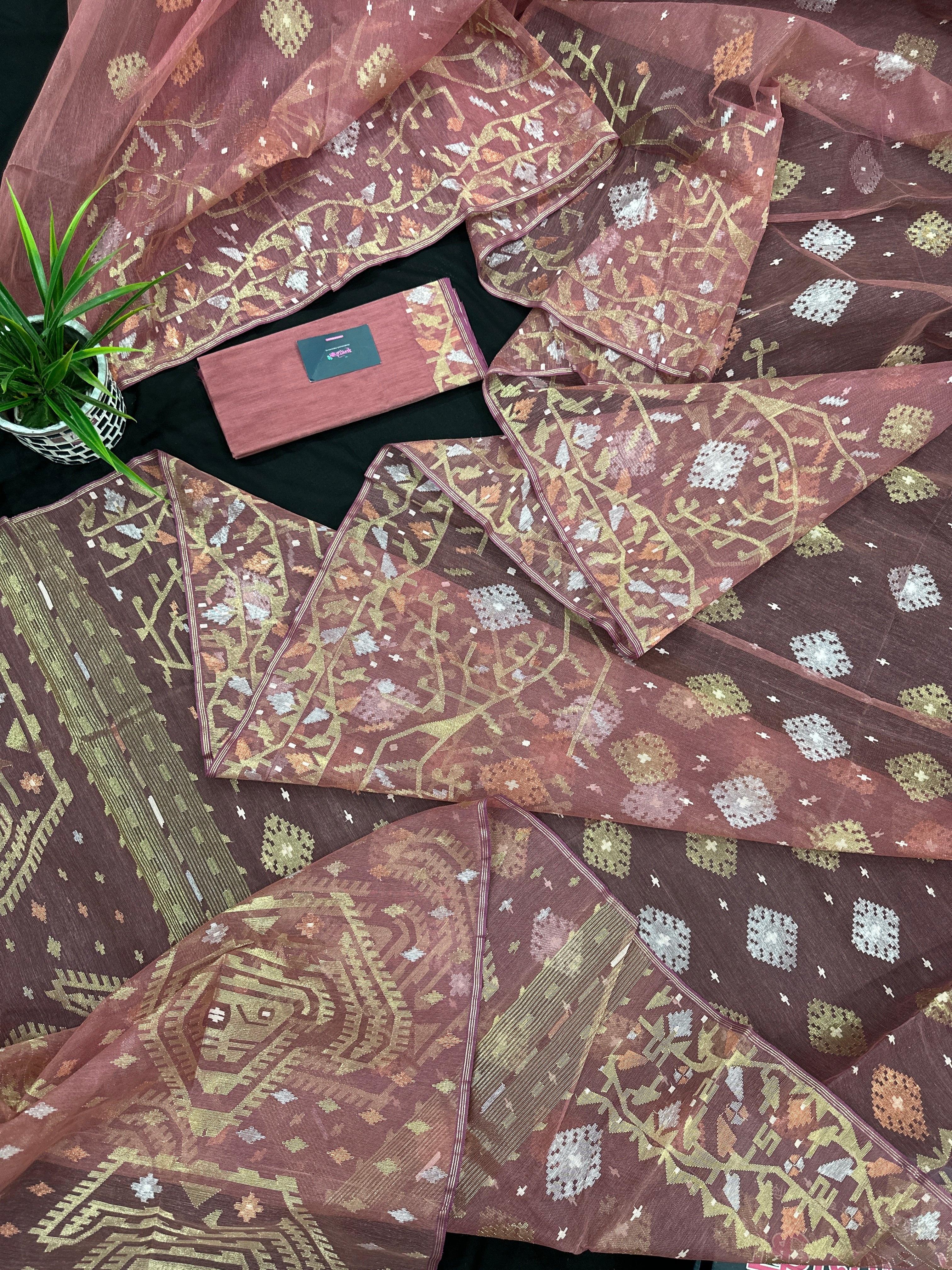 Nude Onion Exclusive Dhakai Jamdani saree with golden silver & copper jori work.