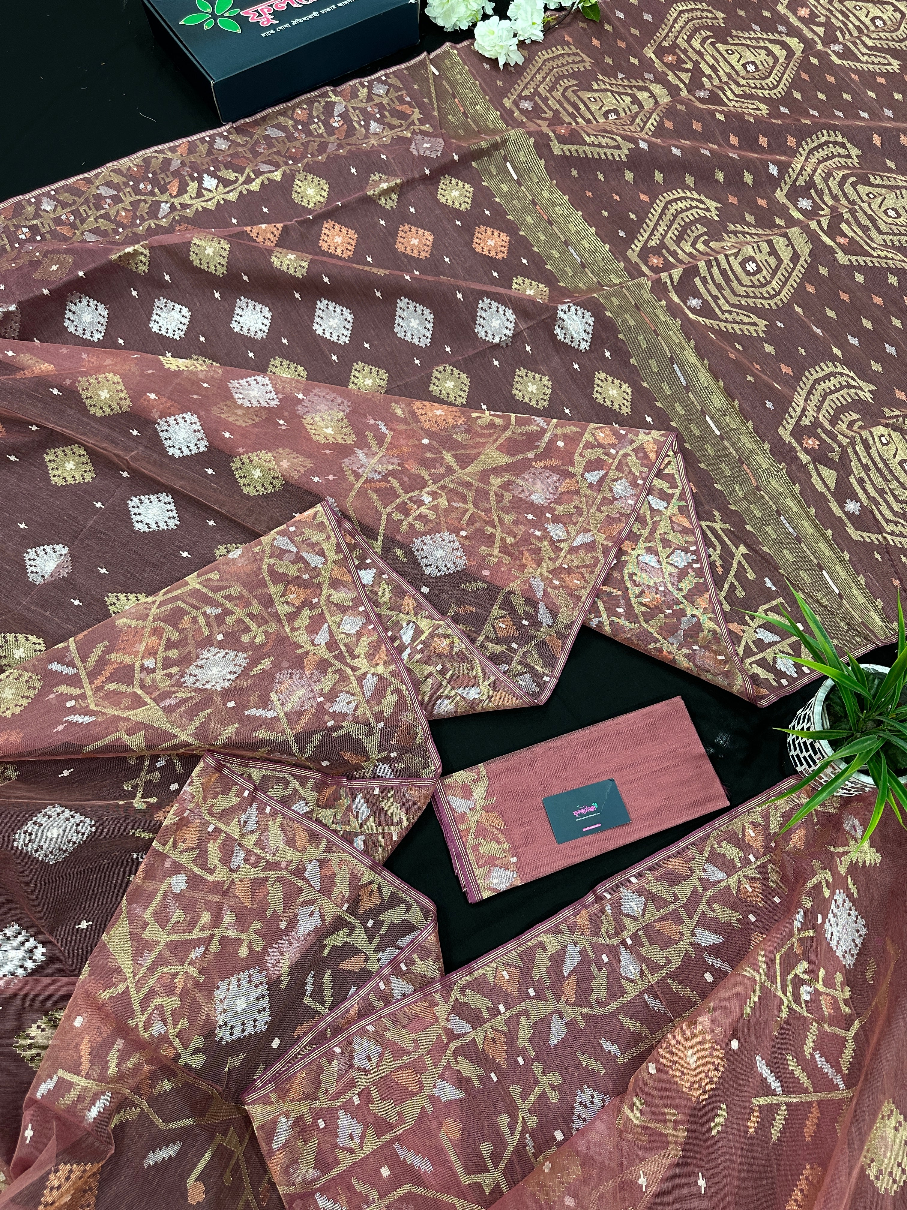 Nude Onion Exclusive Dhakai Jamdani saree with golden silver & copper jori work.