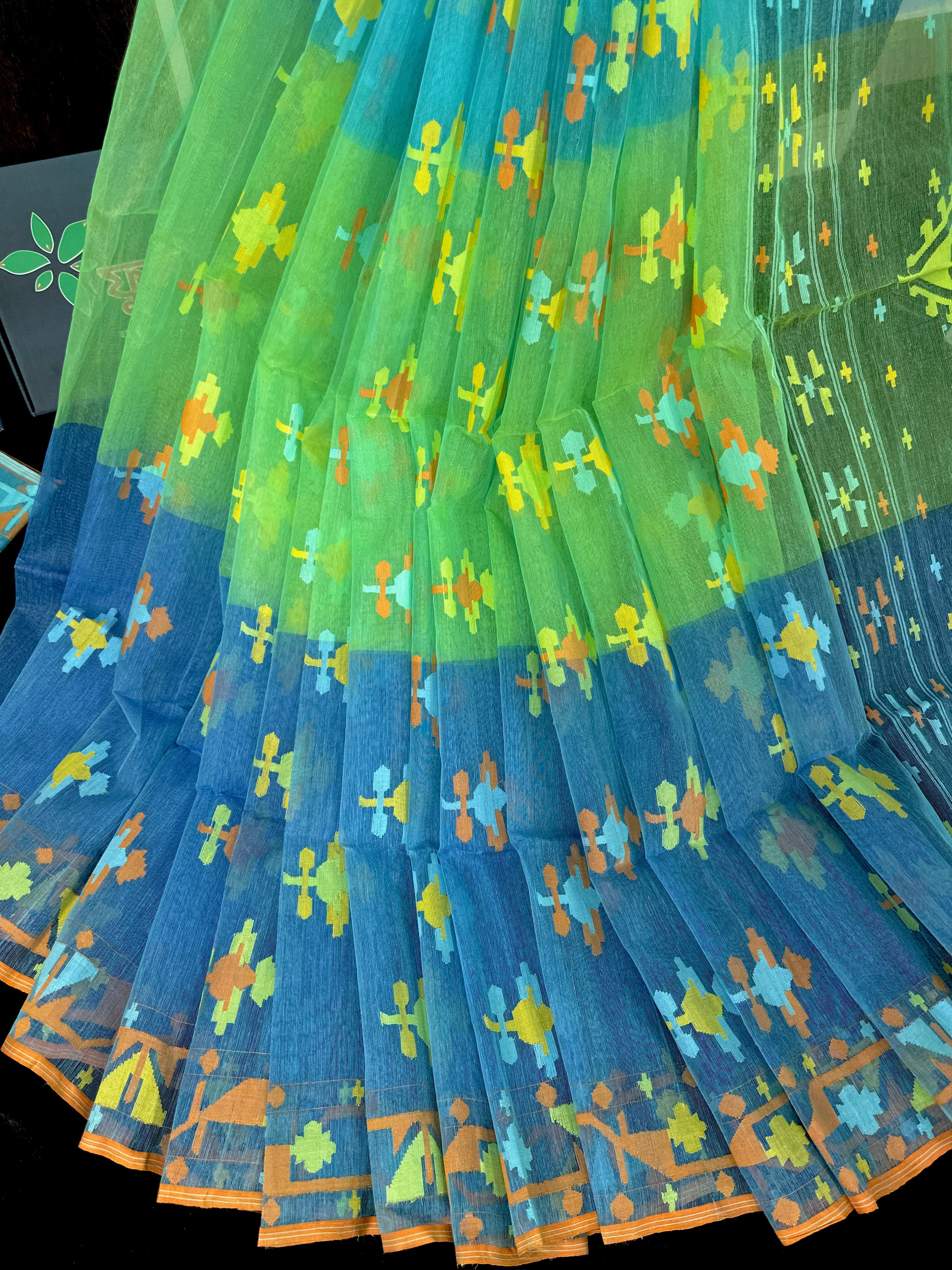 Tripple shaded halfsilk jamdani saree with yellow blue orange threads work.