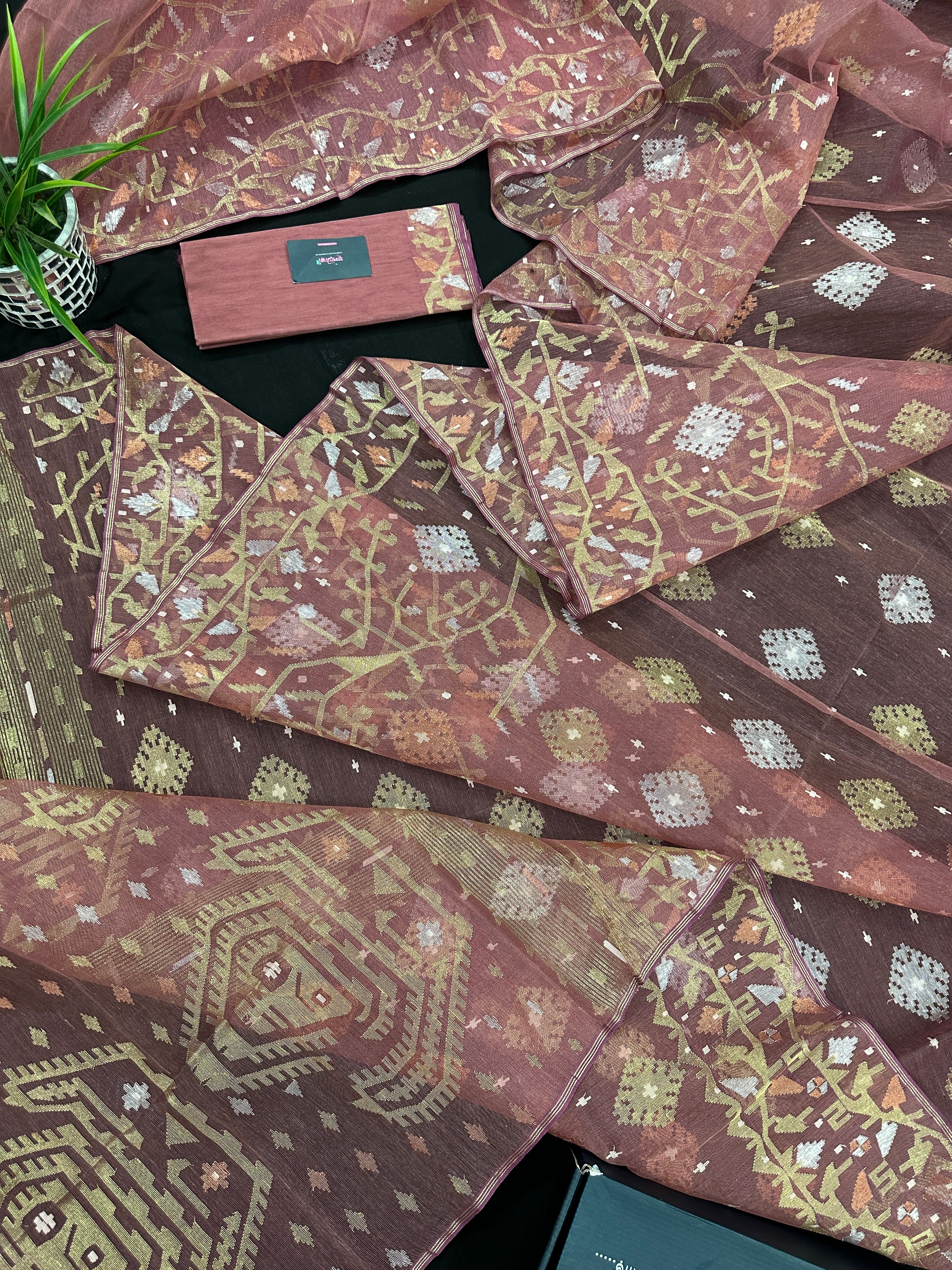 Nude Onion Exclusive Dhakai Jamdani saree with golden silver & copper jori work.