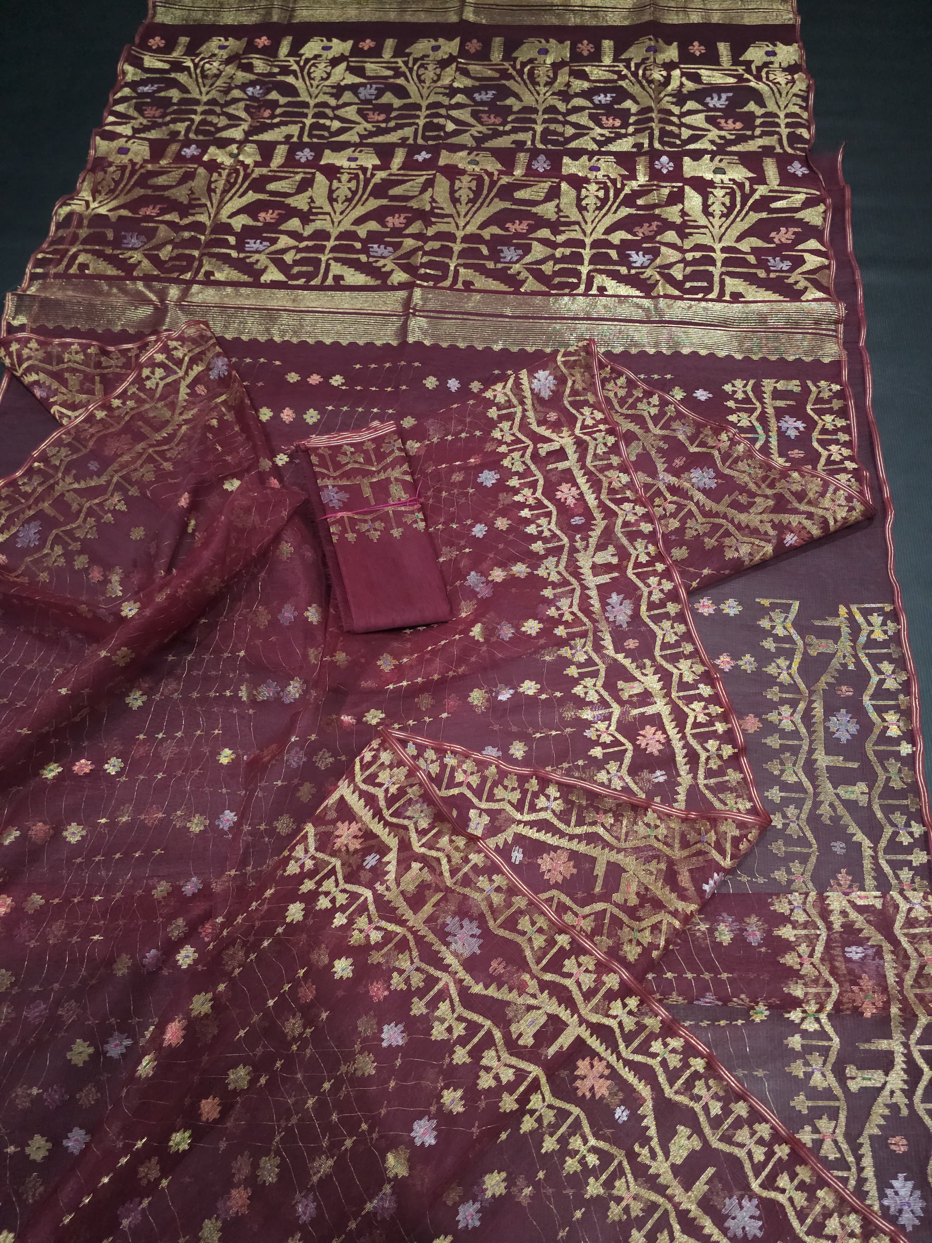 Maroon halfsilk jamdani saree with golden jori work