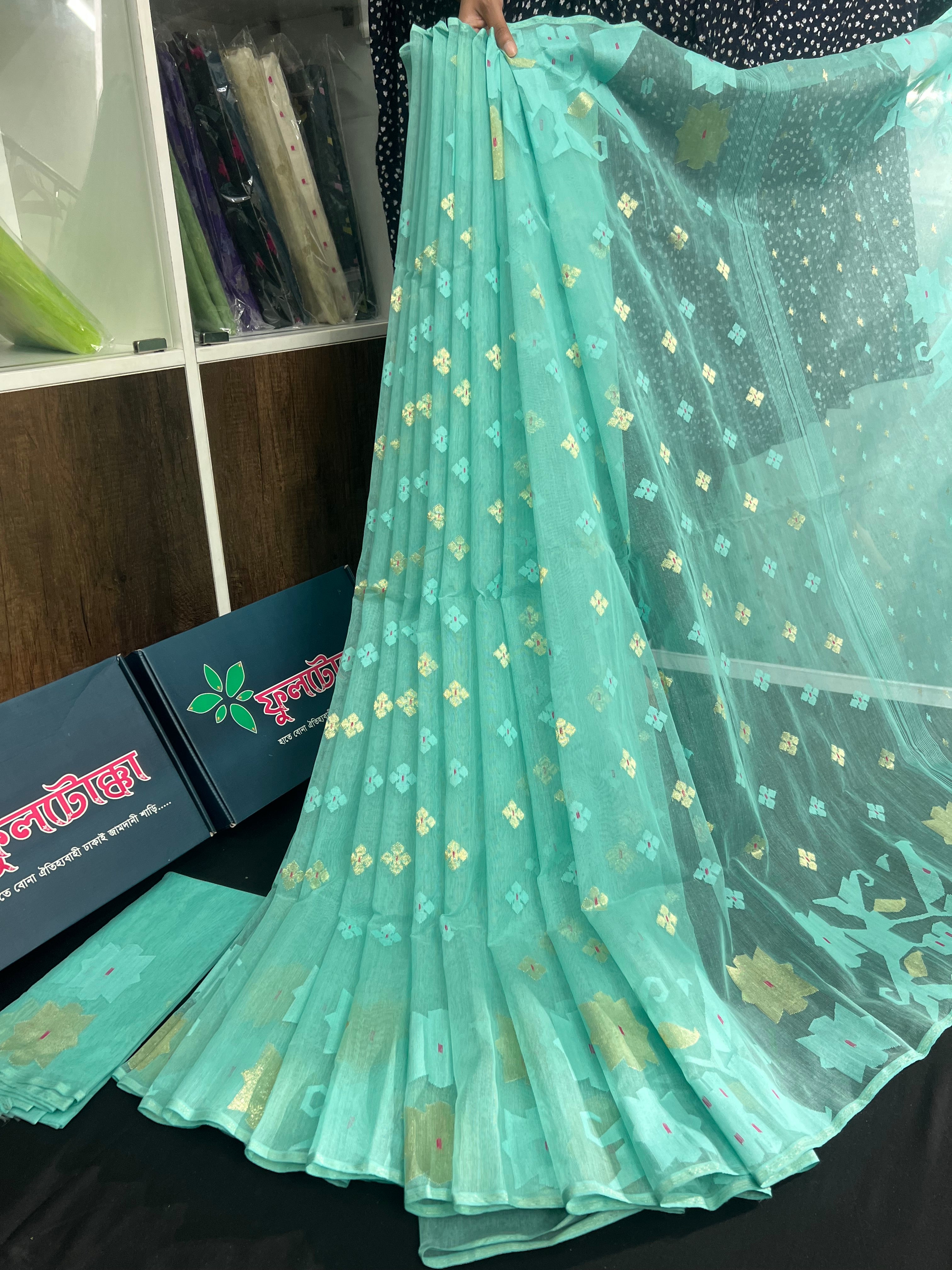 Sky blue halfsilk jamdani saree with golden jori work and self threads work